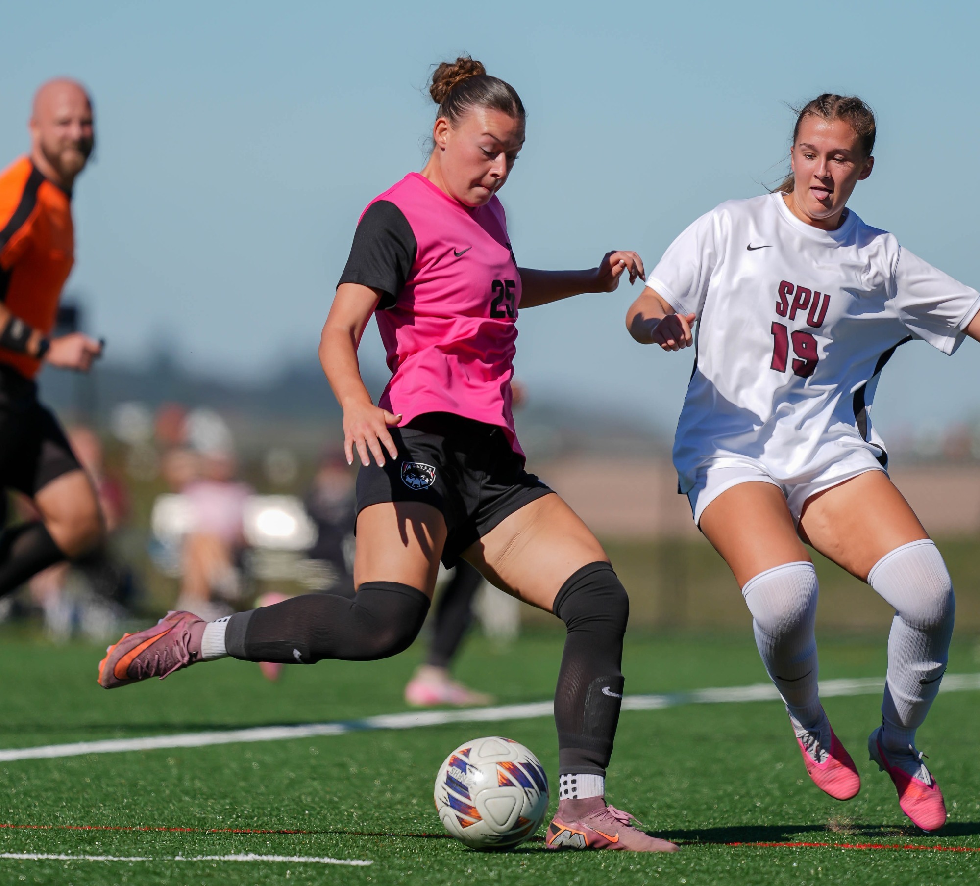 Lillian Mickel looks to pass downfield