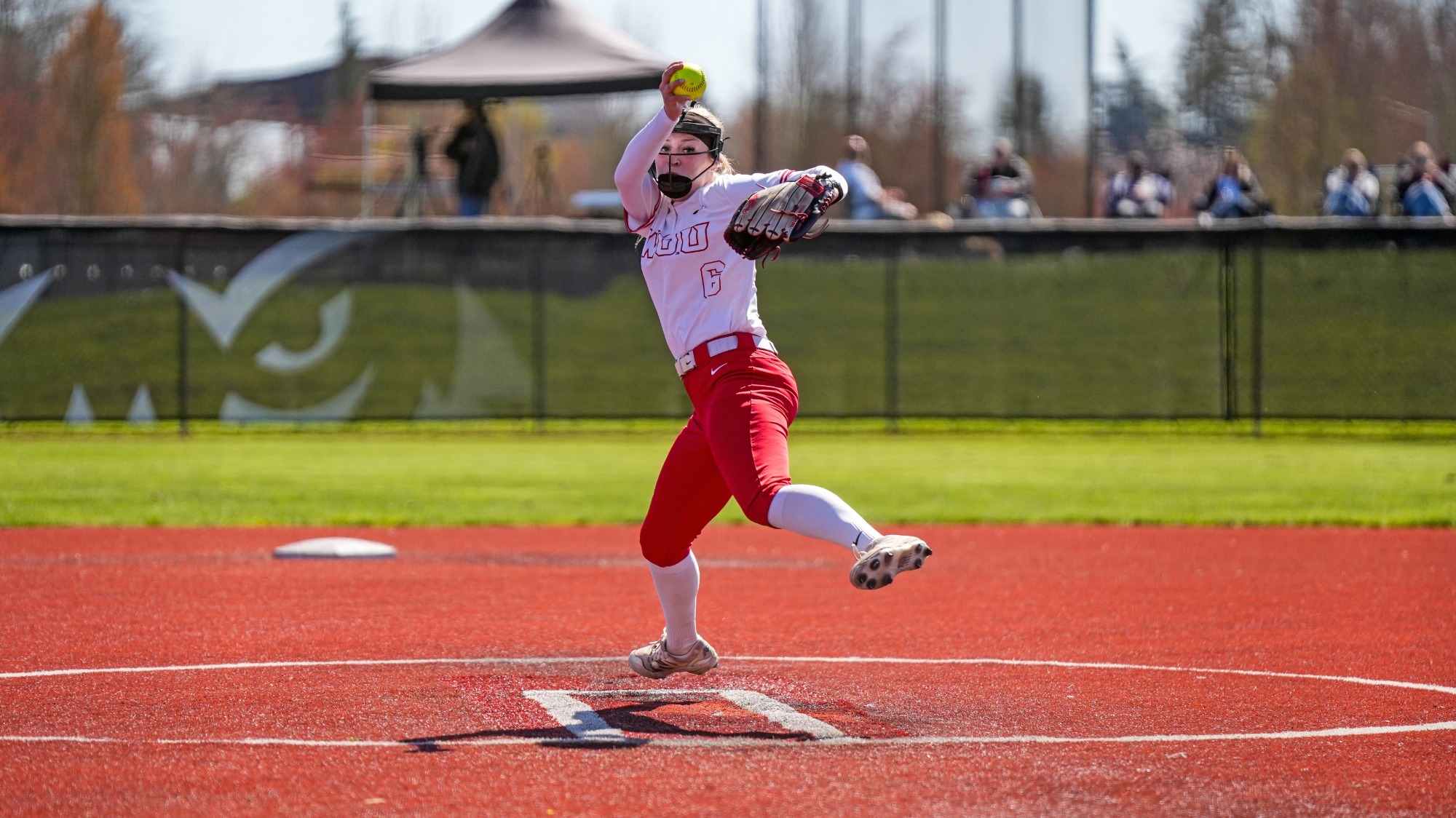 Abby Stansbury throws a pitch against Eastern Oregon