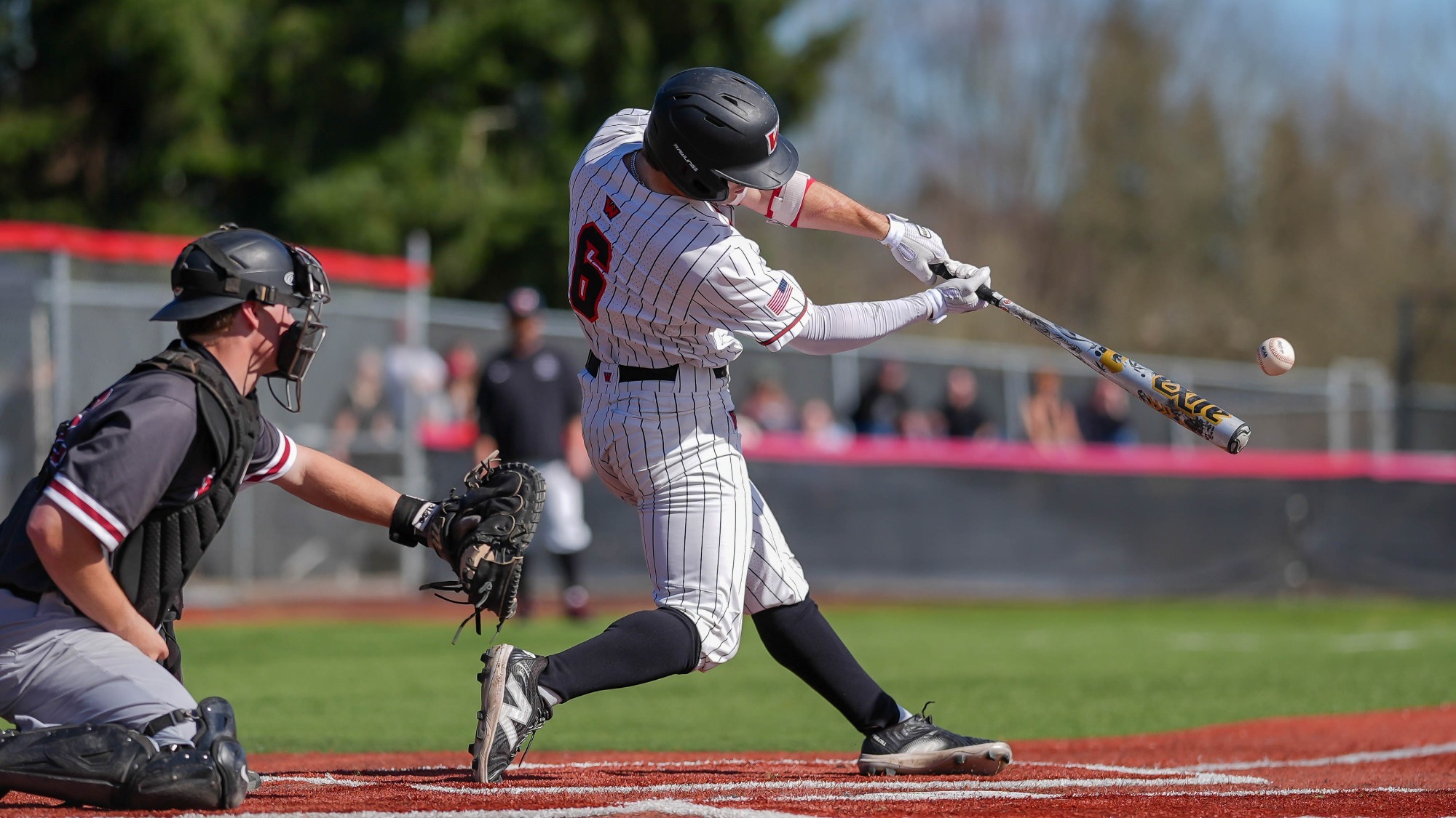 Finn O'Connor makes contact with a pitch