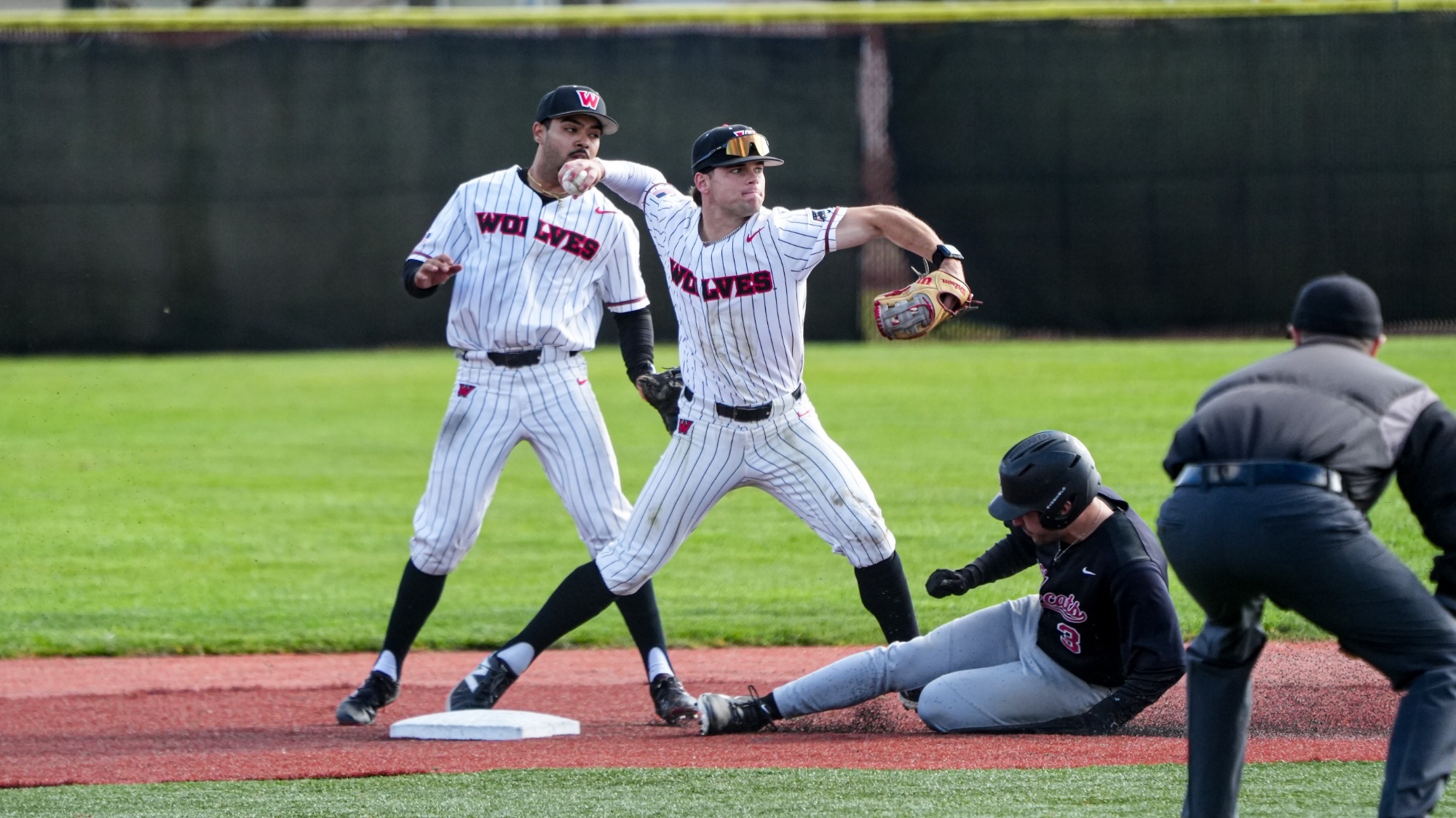 Finn O'Connor turns a double play at second base