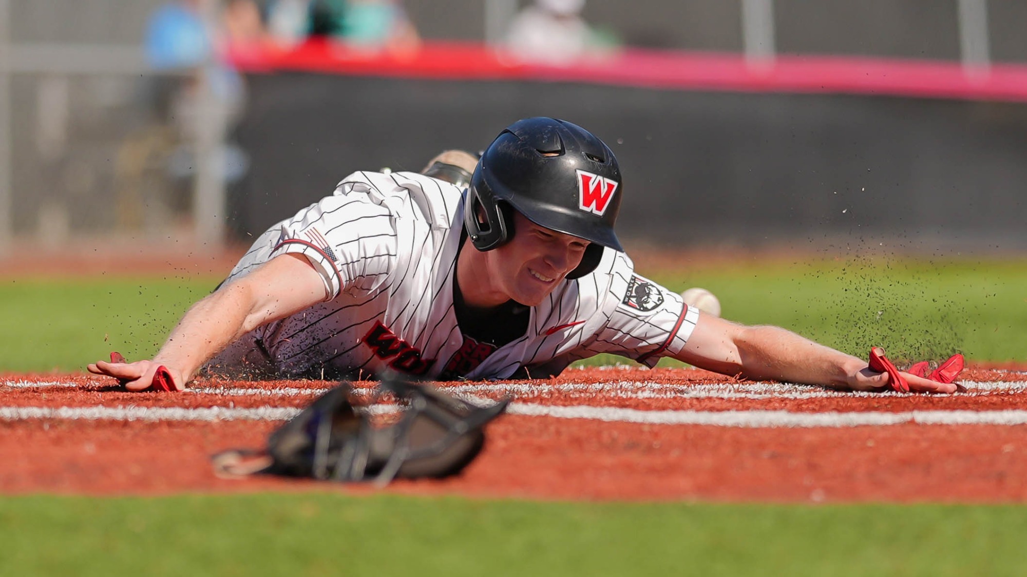 Garvey sliding into home against NNU