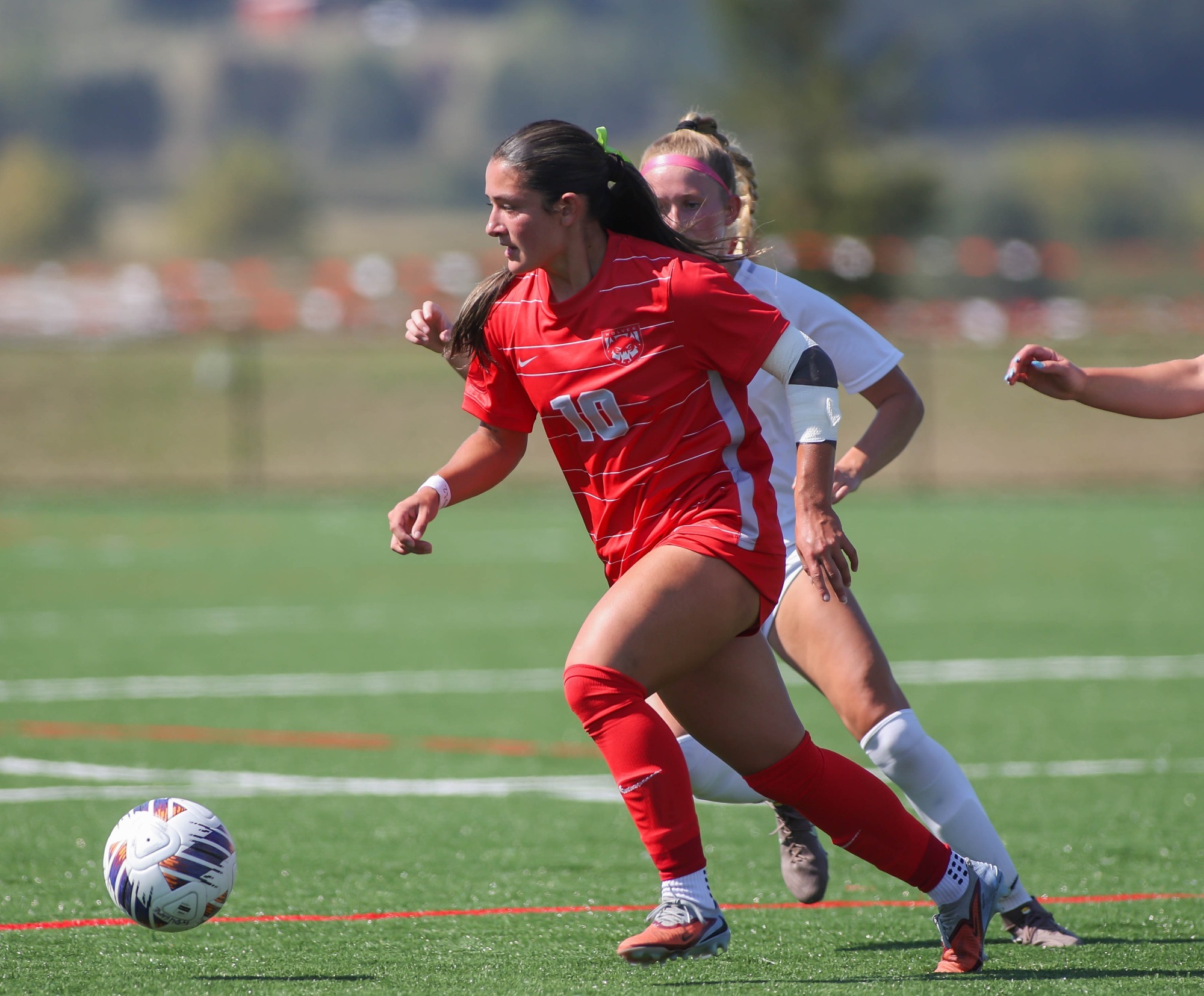 Kyra DiBenedetto works her way down the field