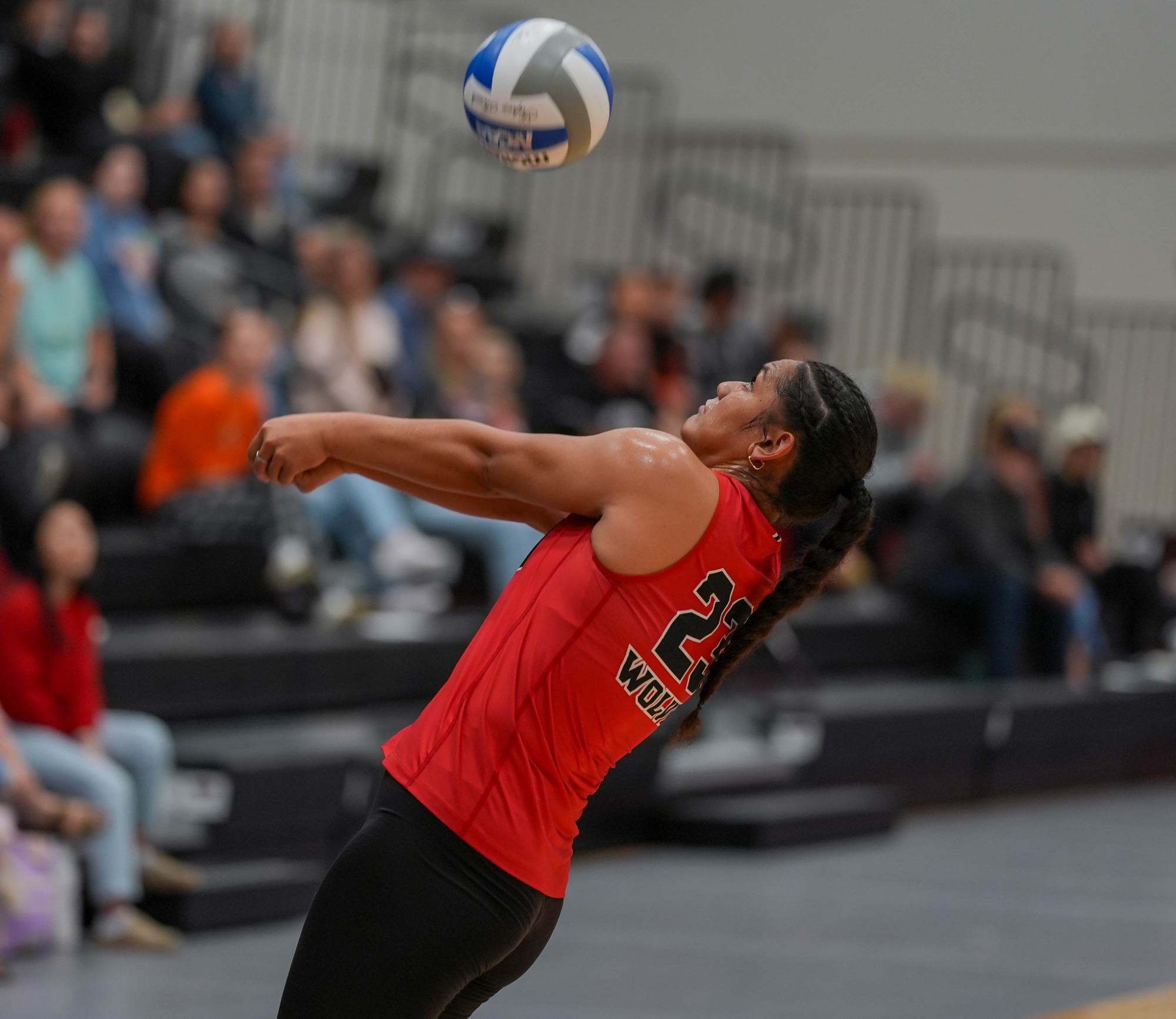 Mele Taumoepeau keeps in play one of her 23 digs on the night against NNU.