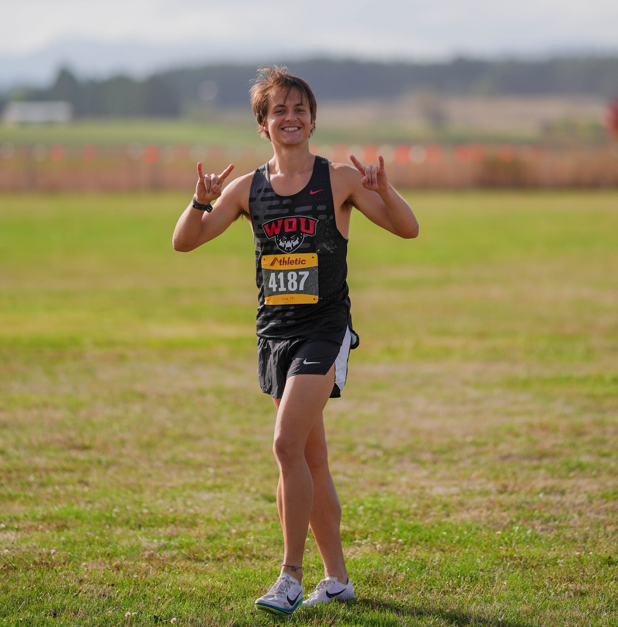 Ethan Bothwell celebrates race win at the Mike Johnson Classic