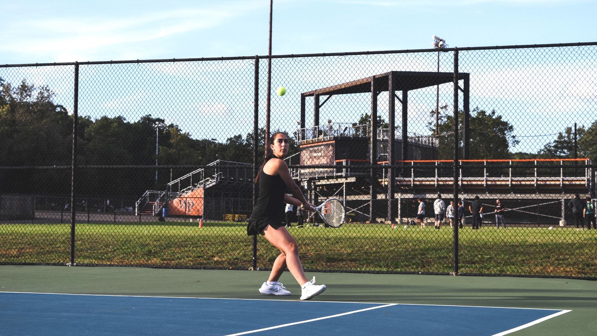 Nadine Mari goes for uses her backhand against Mount Saint Vincent
