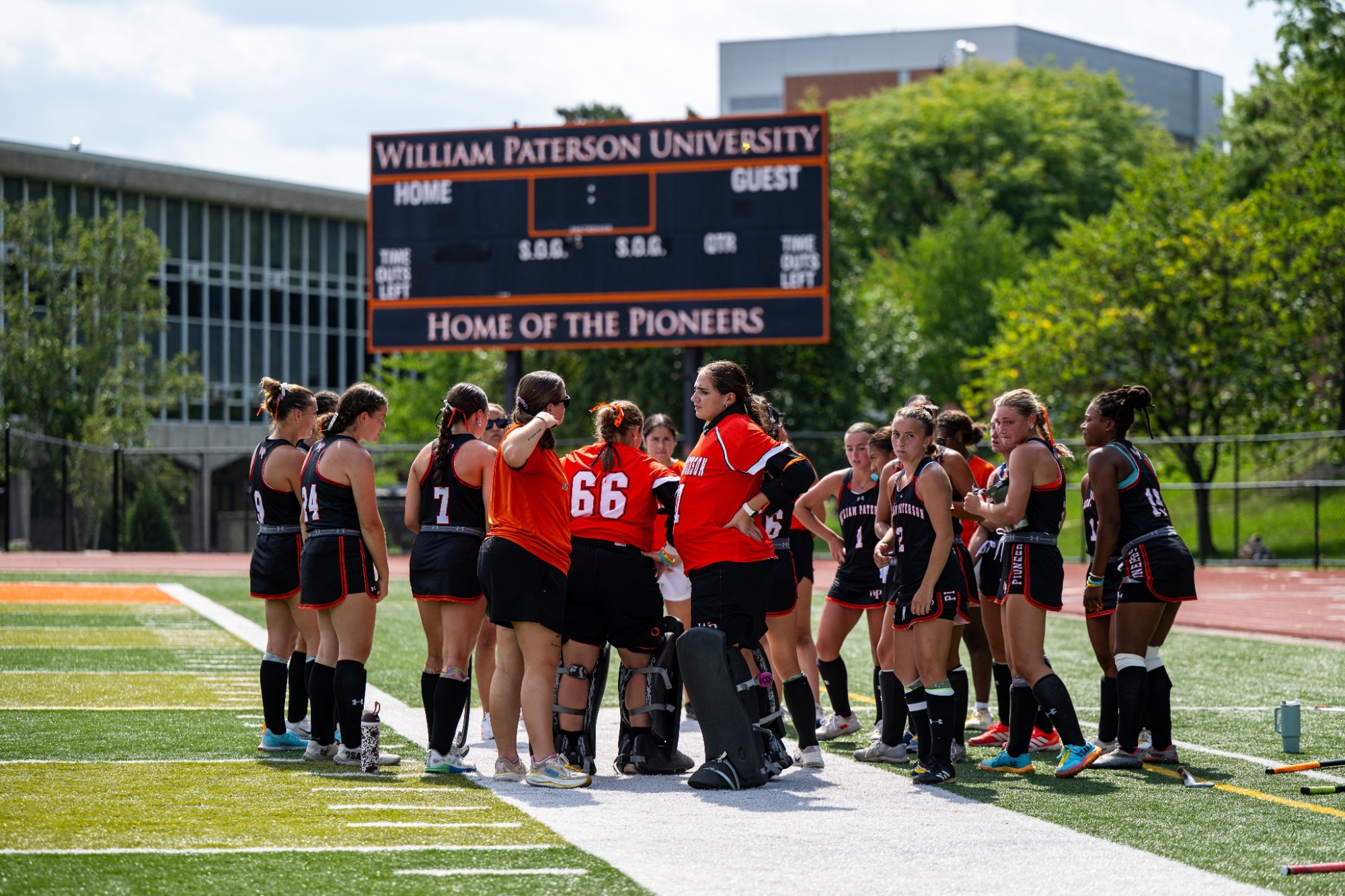 Field Hockey huddles prior to the start of a game
