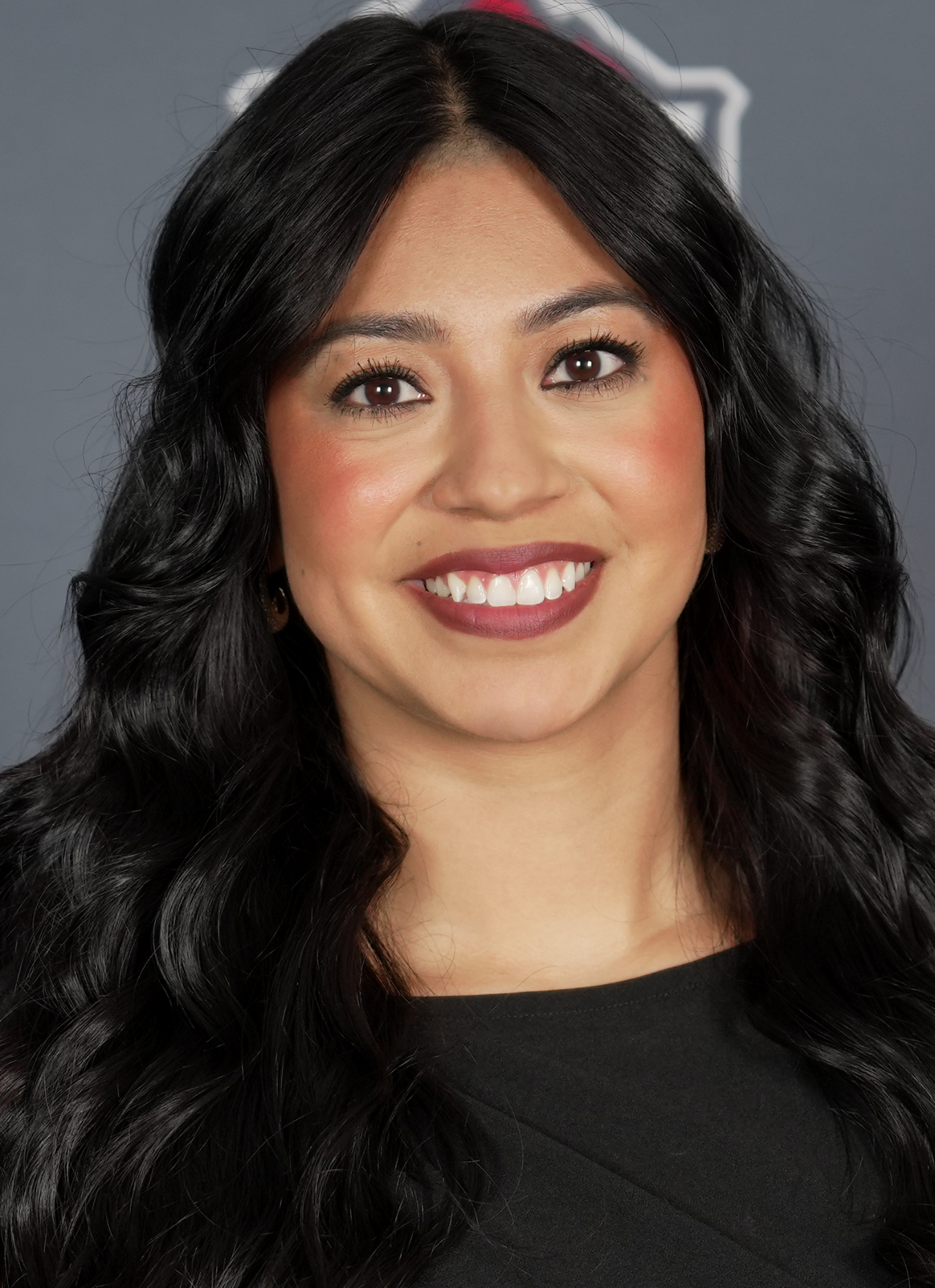 Michayla Contreras head cheer and dance coach