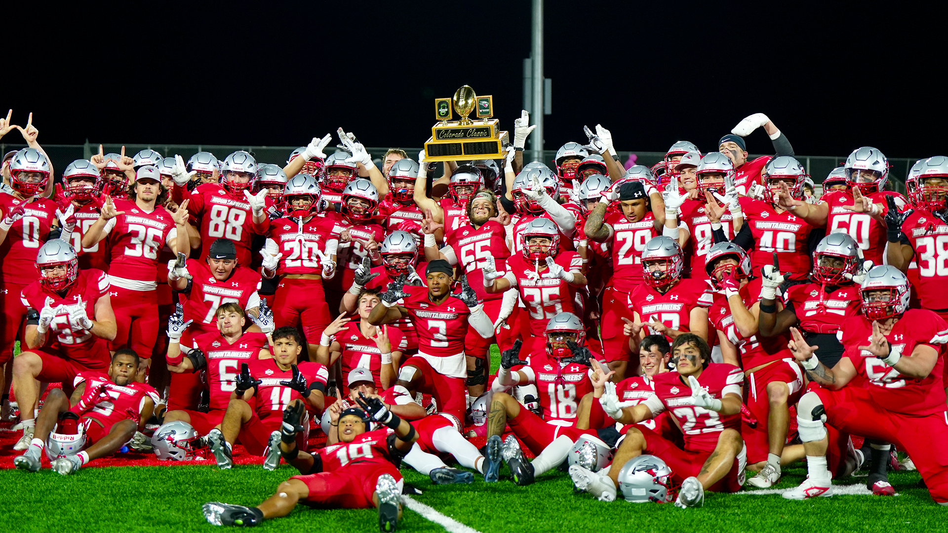 Mountaineers celebrate winning the Colorado Classic game