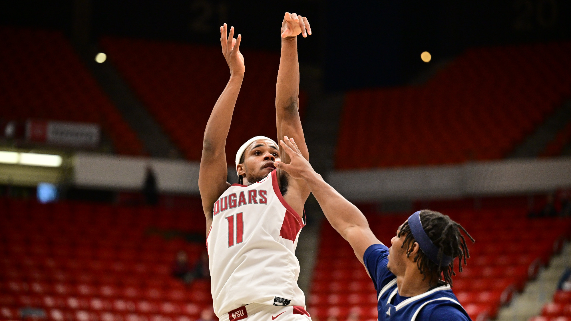 Jerone Morton shoots over a Nevada defender, Dec. 7, 2025