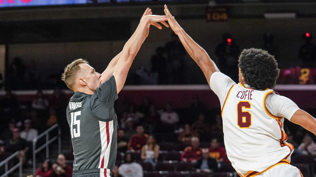 Rihards Vavers shoots over a USC defender, Dec. 14, 2025