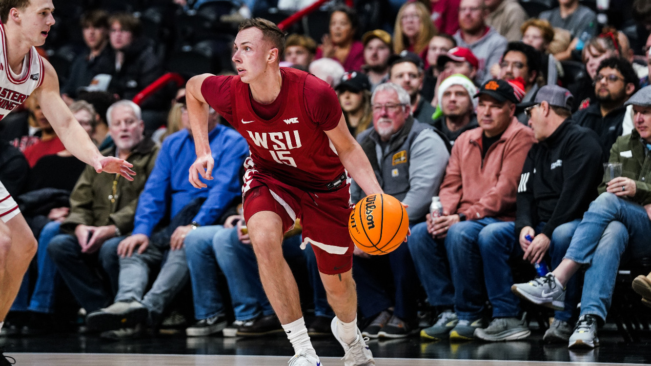 Rihards Vavers looks to drive against Eastern Washington, Dec. 17, 2025