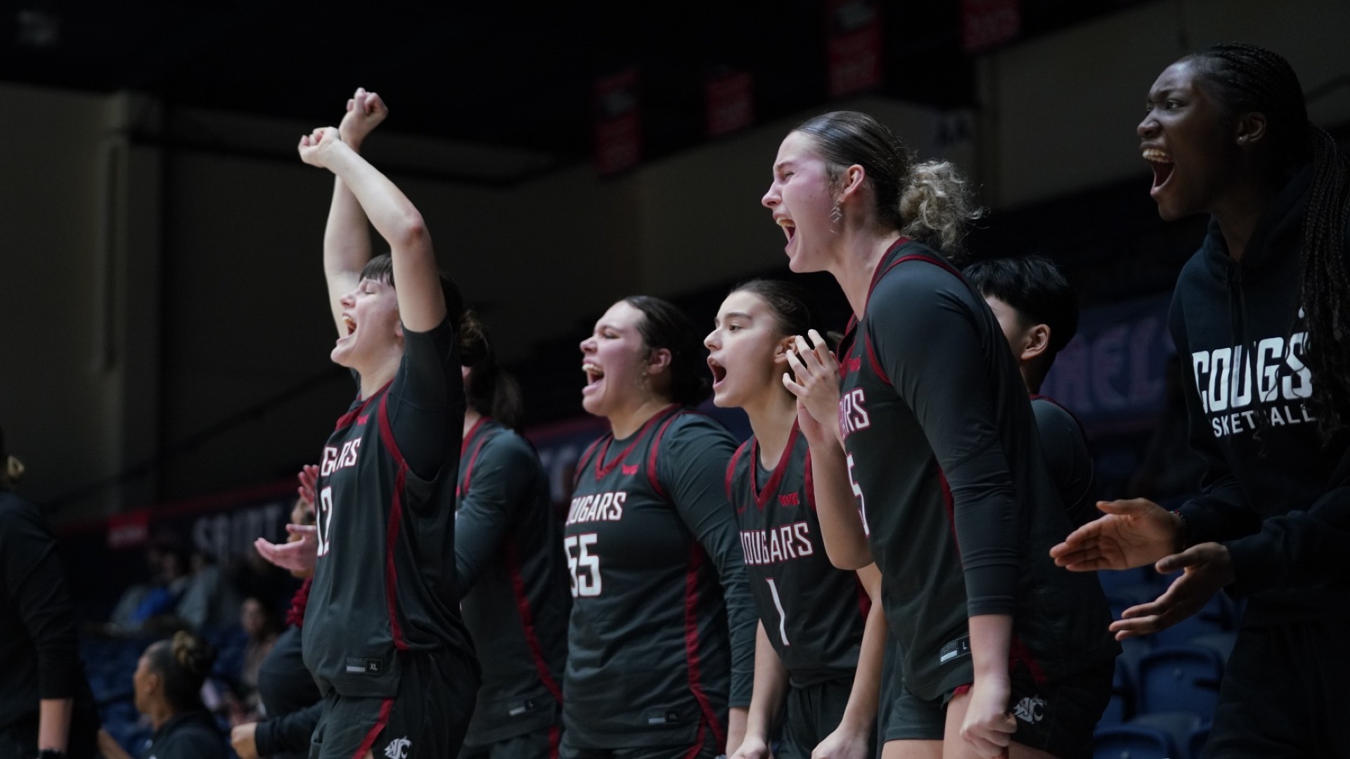 25_1_15 WSU WBB bench celebrates at Saint Mary's