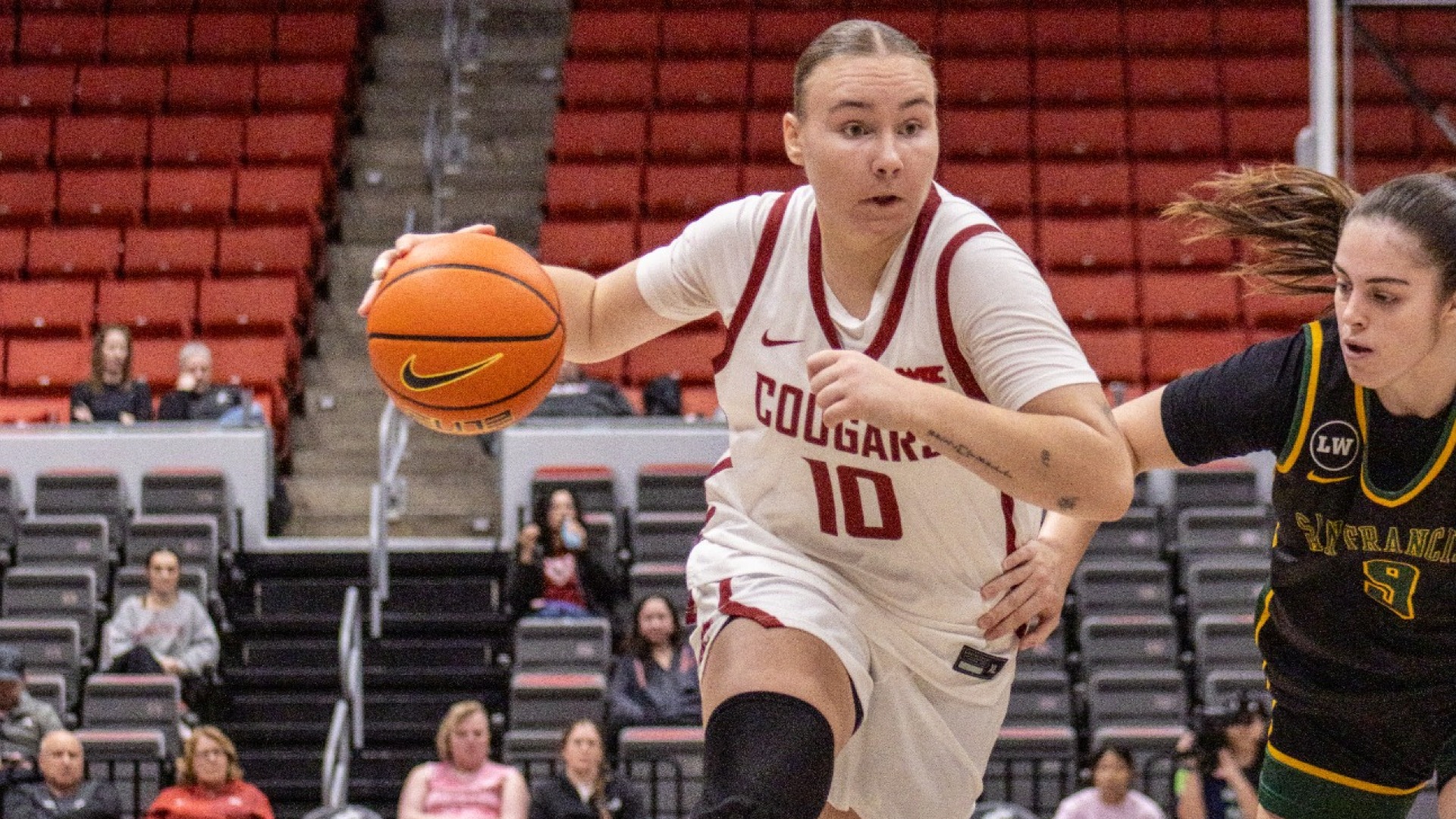 26_1_17 WSU WBB Charlotte Abraham dribbles up court against San Francisco