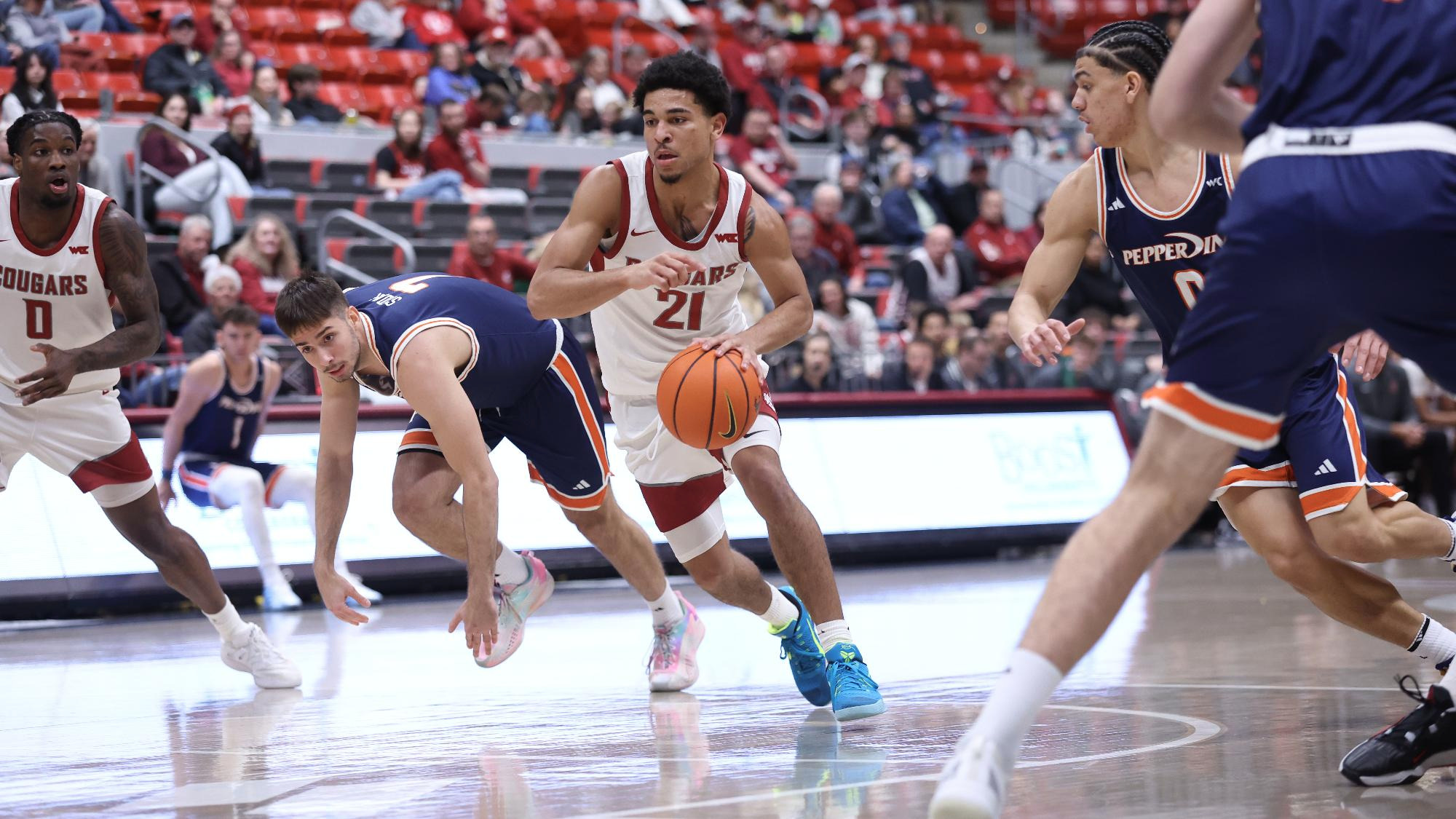 Ace Glass drives through the lane against Pepperdine, Jan. 24, 2026