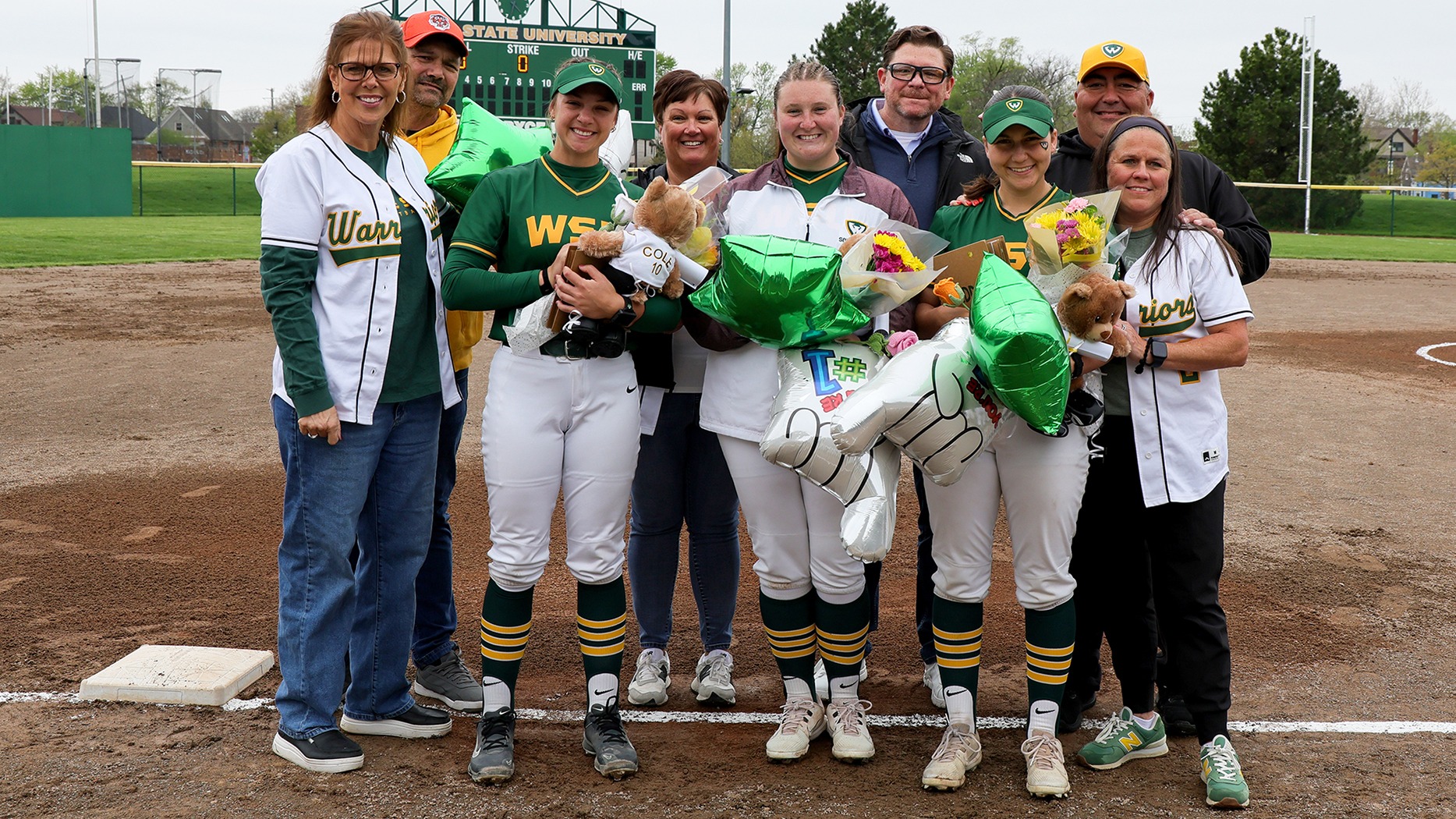 2026 Softball Seniors with parents