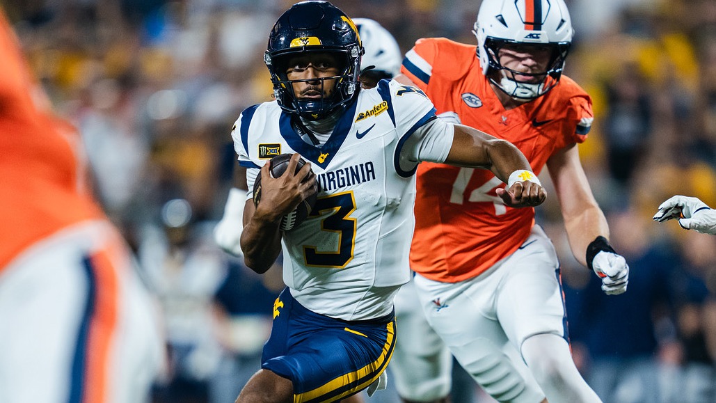Michael Hawkins Jr. wearing West Virginia No. 3 runs against Virginia in the 2026 Duke's Mayo Classic
