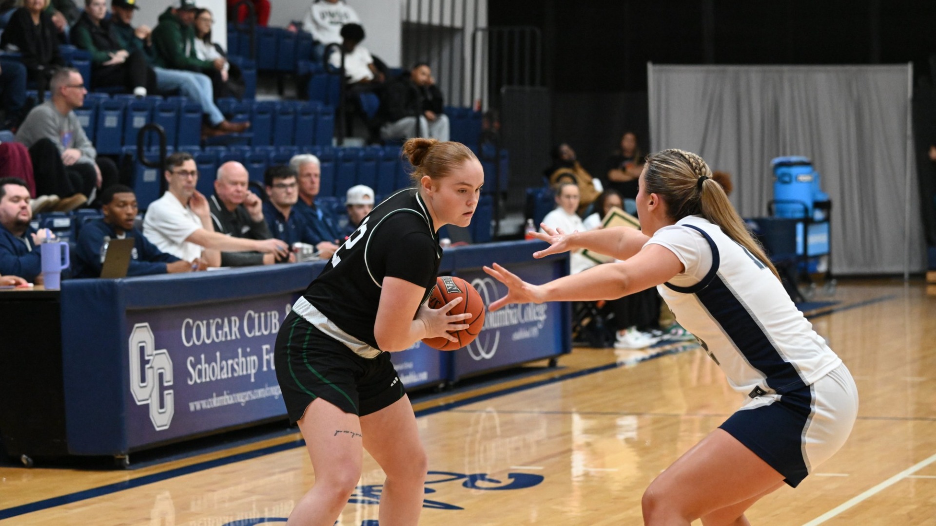 Owls Fall to Cougars in Columbia