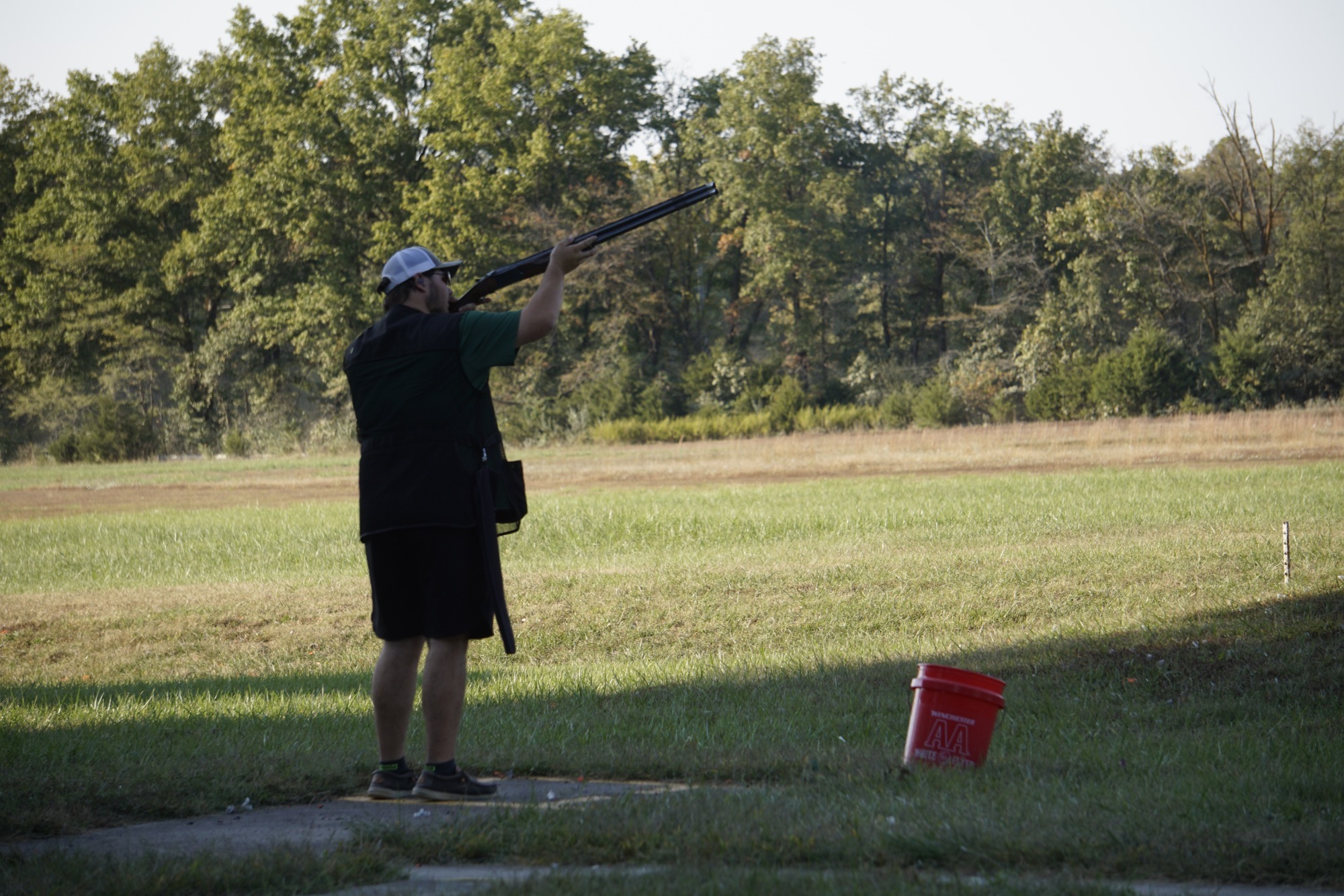 William Woods' Connor Hess shoots in a shotgun sports competition.