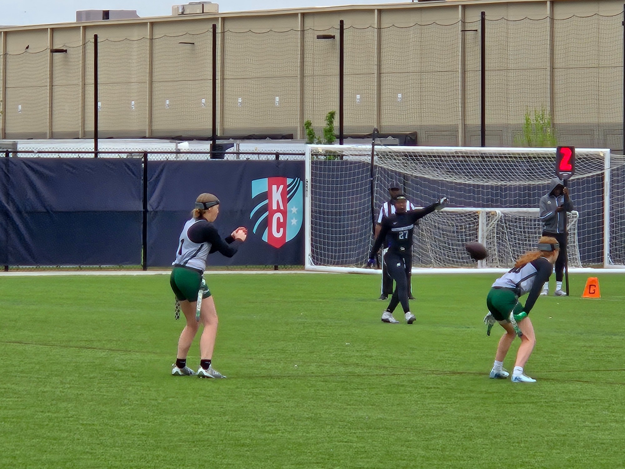 William Woods's Makenzie Hicks takes a snap from Evonne Bruestle.