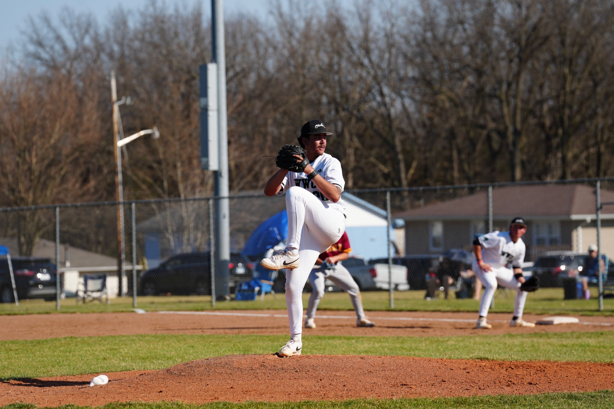 Owls split with the spartans