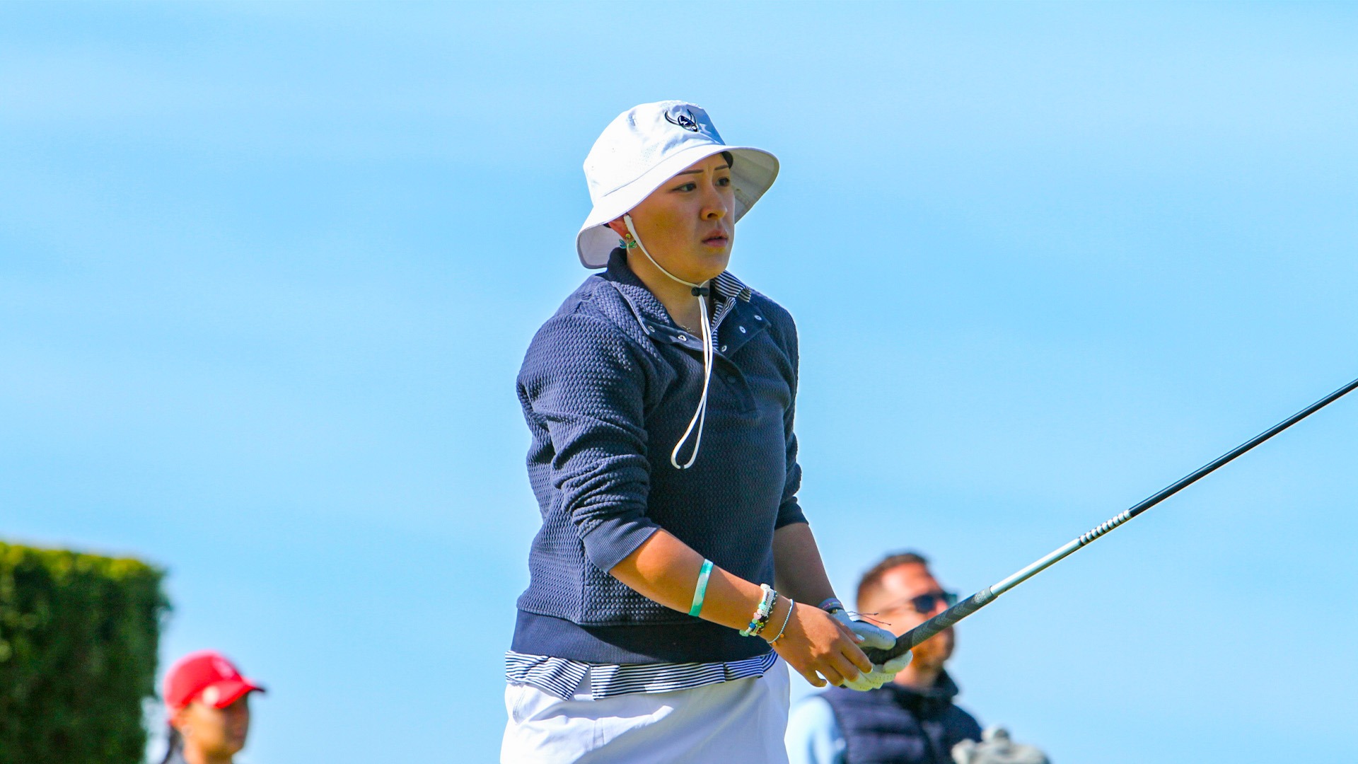 Lauren F. Lee at 2026 GNAC Golf Championships - golfer following through on a shot