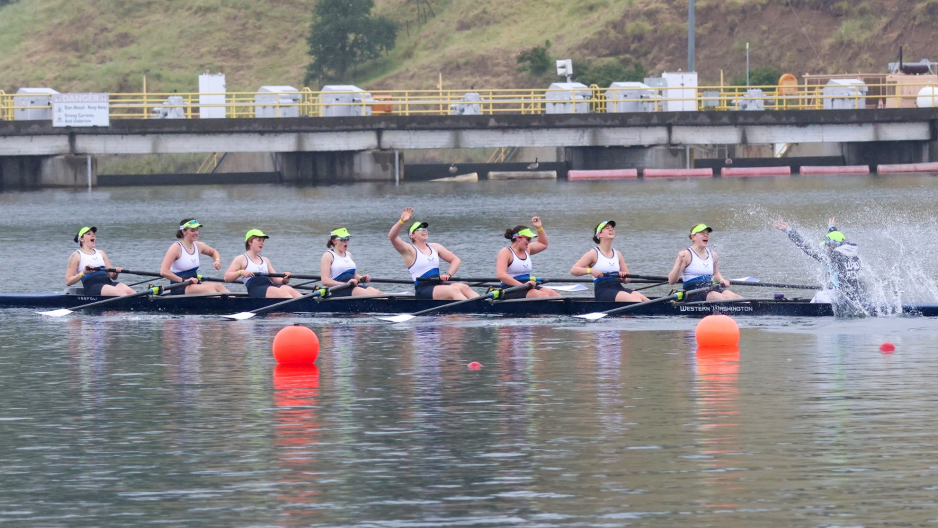 Varsity Eight at WIRA Championships | Photo of WWU's varsity eight celebrating in a boat on water