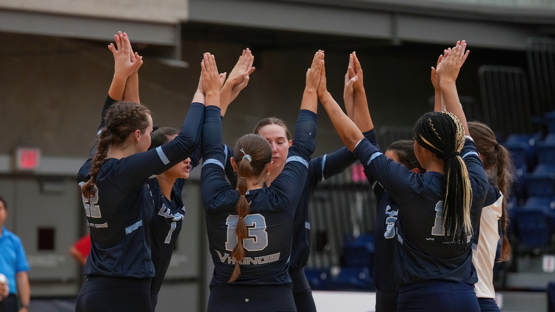 Team Volleyball Huddle from match at Simon Fraser