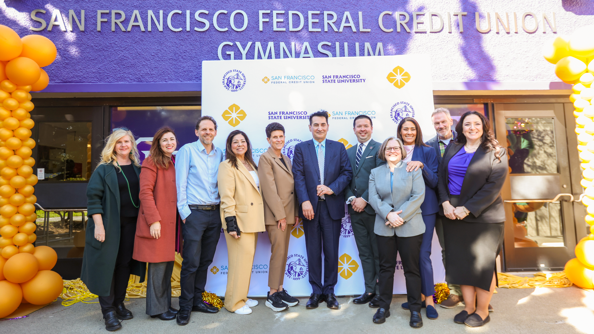 Members of San Francisco Federal Credit Union join SFSU President Lynn Mahoney, SFFedCU President and CEO Ray Shams, and Director of Athletics Brandon Davis for the San Francisco Federal Credit Union Gymnasium Naming Ceremony