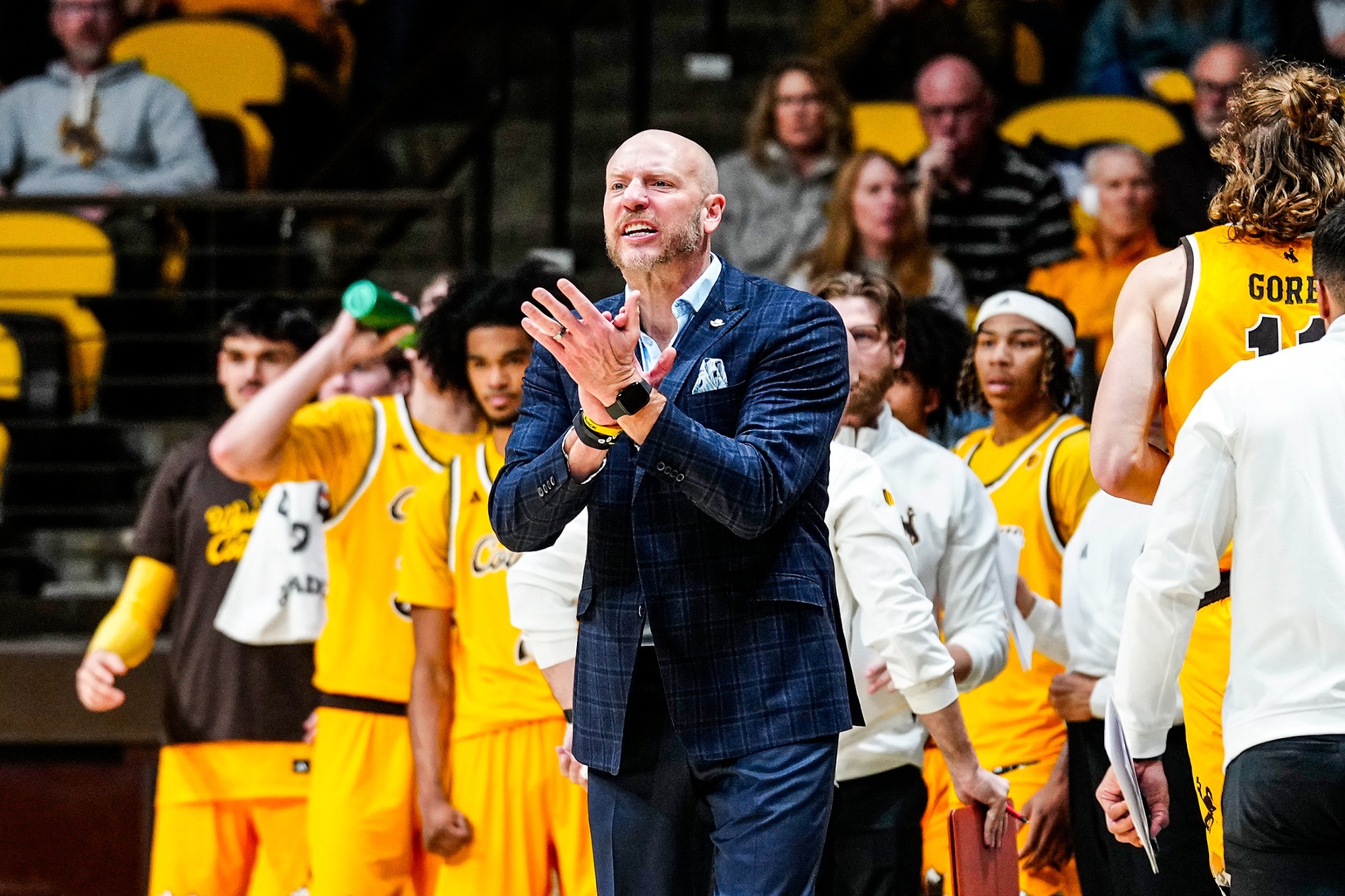 Sundance Wicks cheers on his team against cal State Fullerton in 2025
