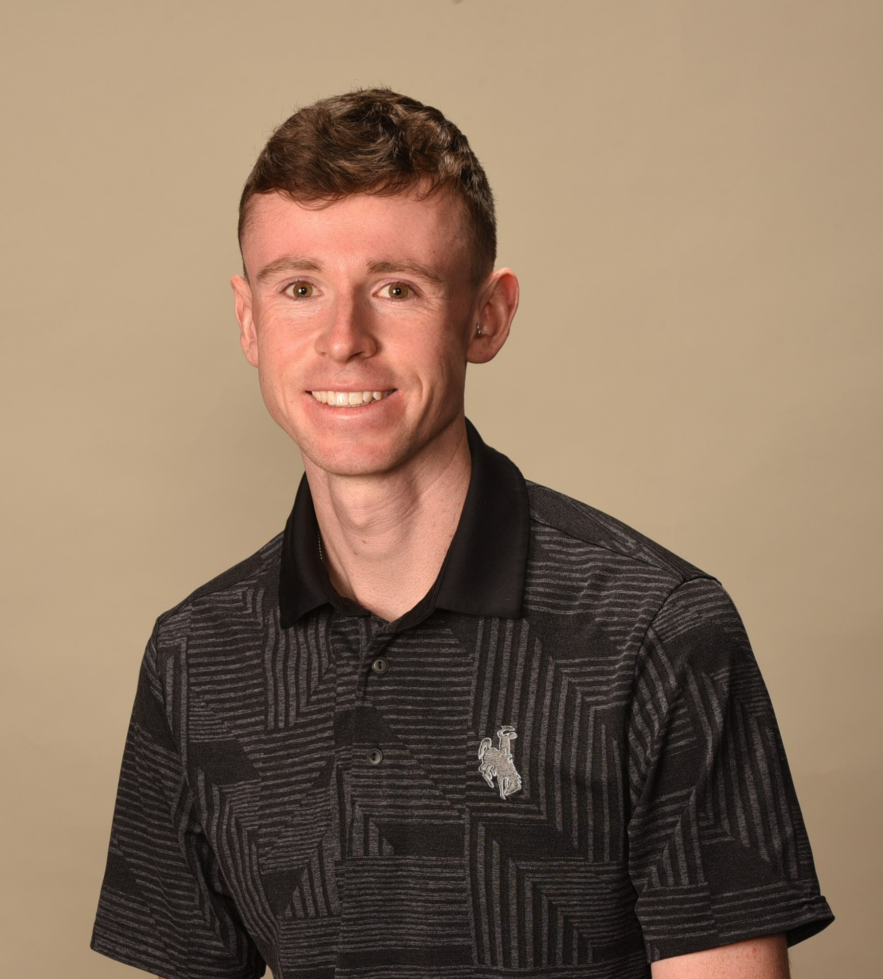Headshot of Coach Oisin O'Gailin