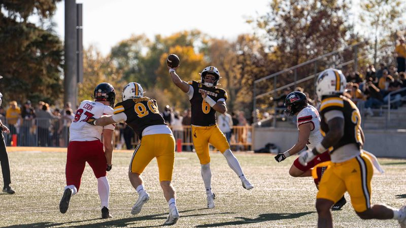 Tyler Hughes throws a pass vs. NIU