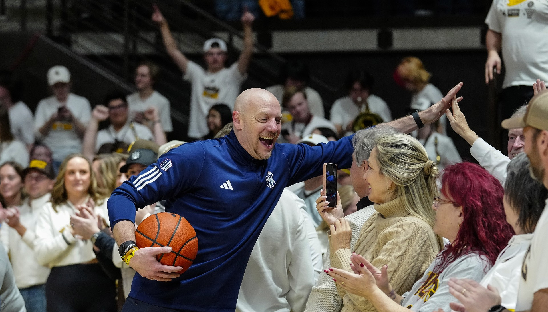 Sundance Wicks celebrates with the crowd after the Border War.