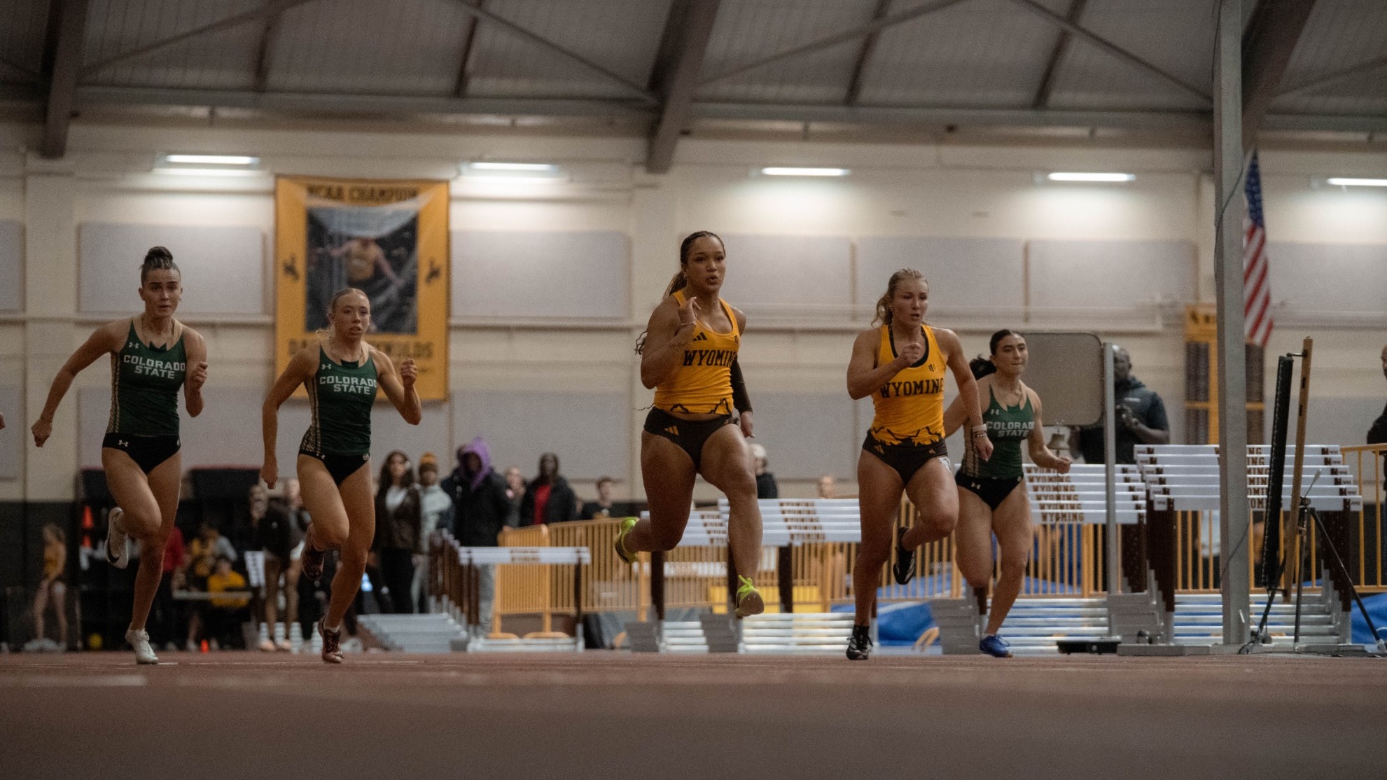 Taliah Morris and Faith Jehu running the 55 meters at the Power Meet