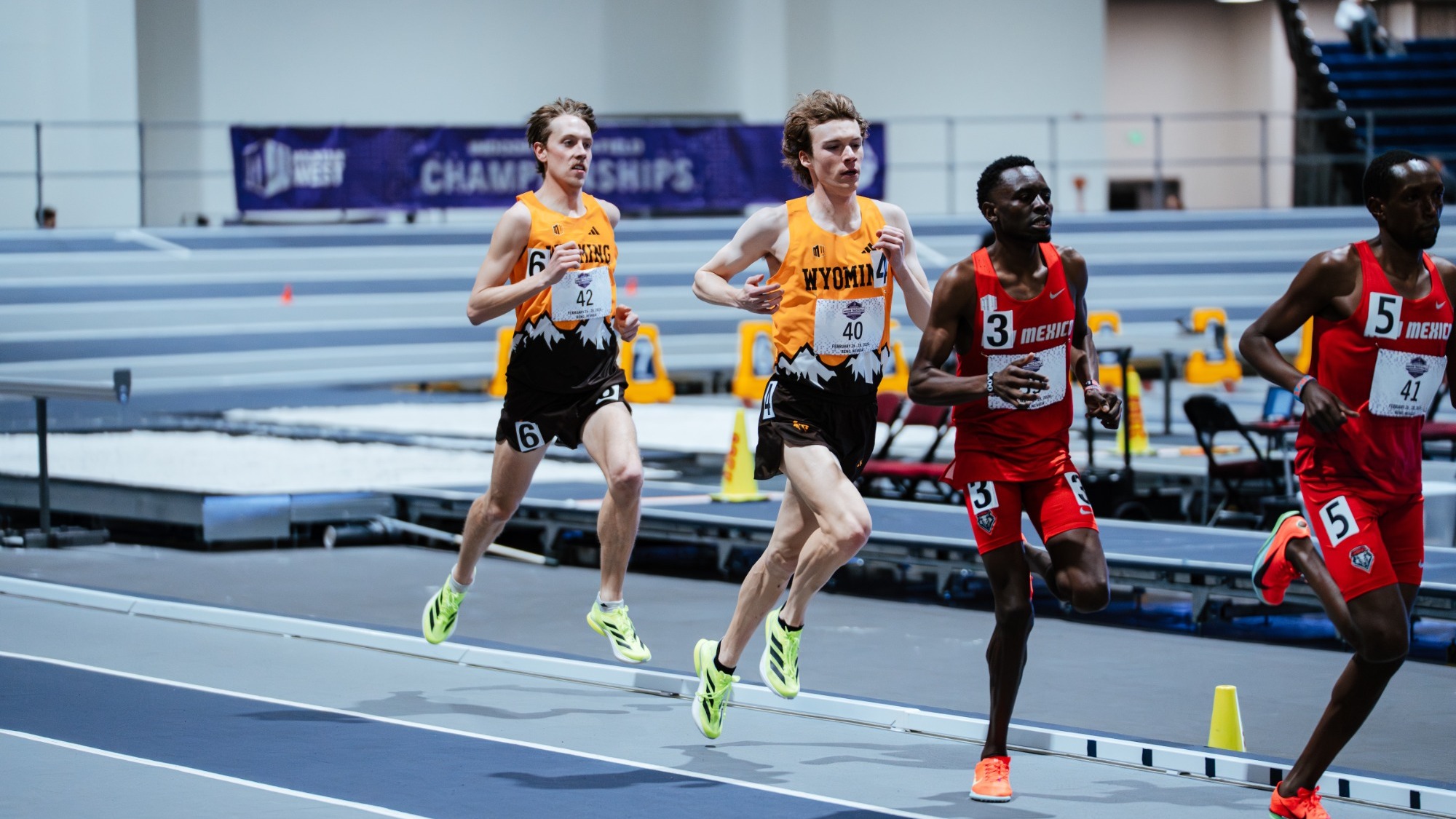 Jacob White and Ryker Holtzen running the 5,000 meters at the MW Indoor Championships