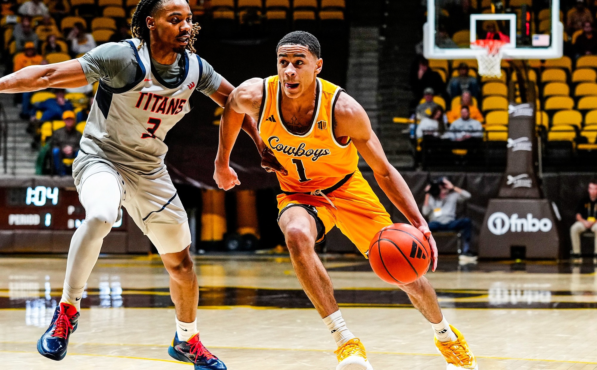 Damarion Dennis Drives to the Hoop against Fullerton in 2026