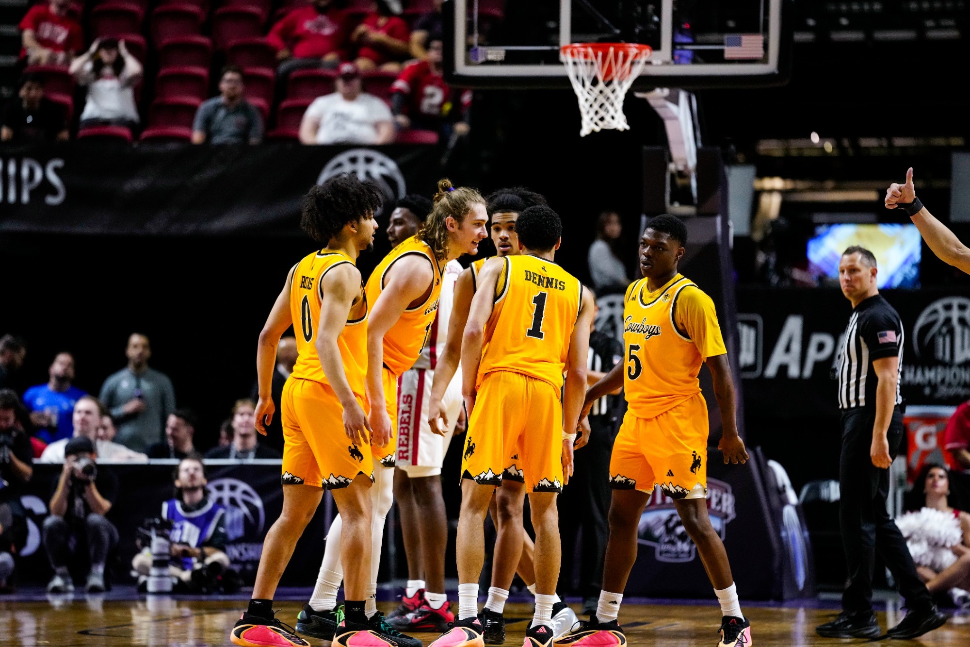 Cowboys huddle during the MW Tournament in 2026