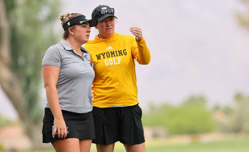 Wyoming freshman Kiley Reisner and head coach Josey Stender at the 2026 Mountain West Women's Golf Championships.