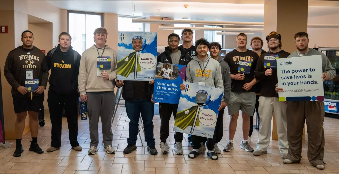 Wyoming football players participating in 