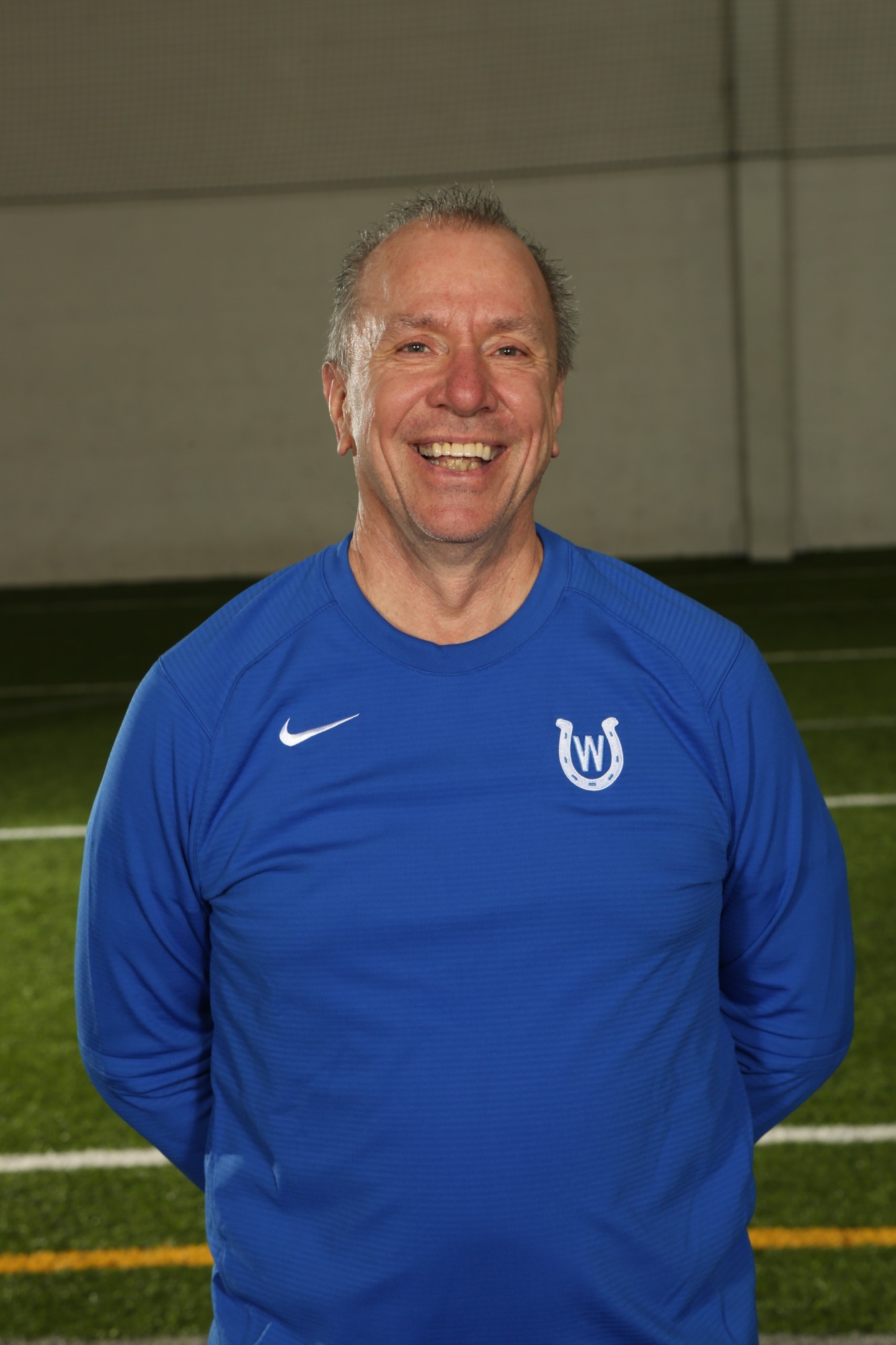 Coach Dennis Schapker