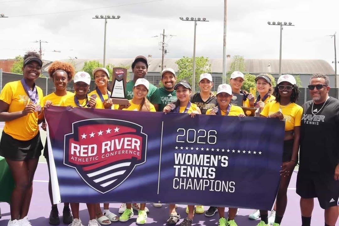 Women's Tennis with 2026 RRAC championship banner