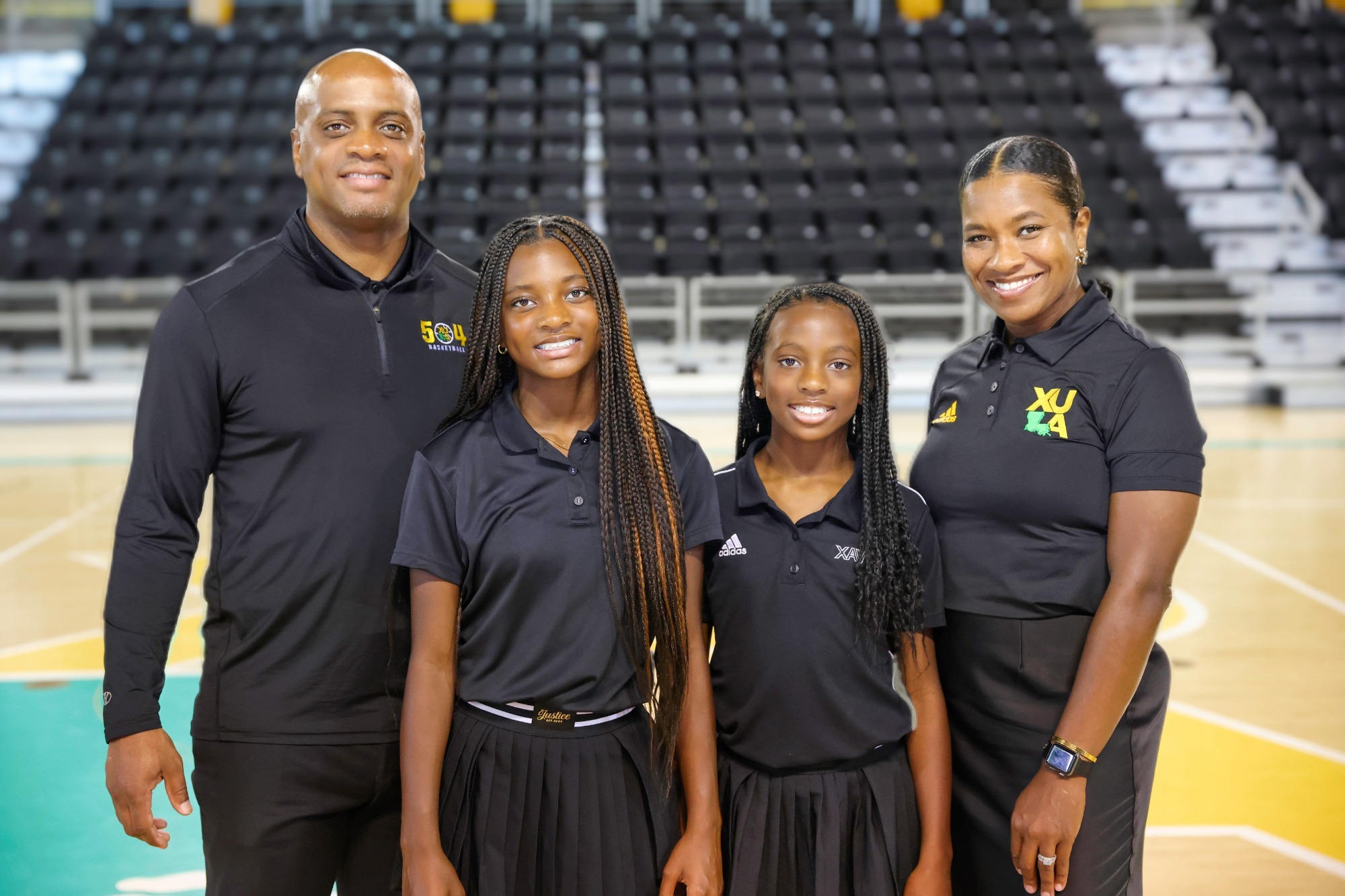 Coach Tyrone Mitchell and family
