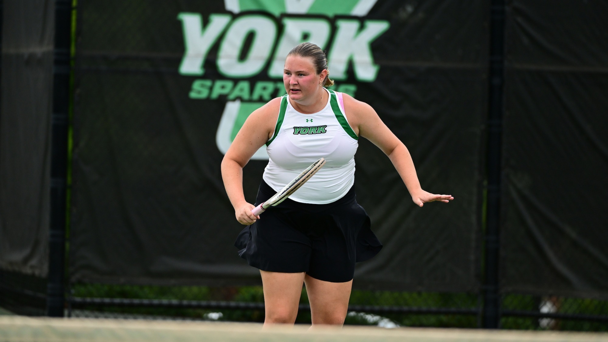 female tennis player stares down opponent