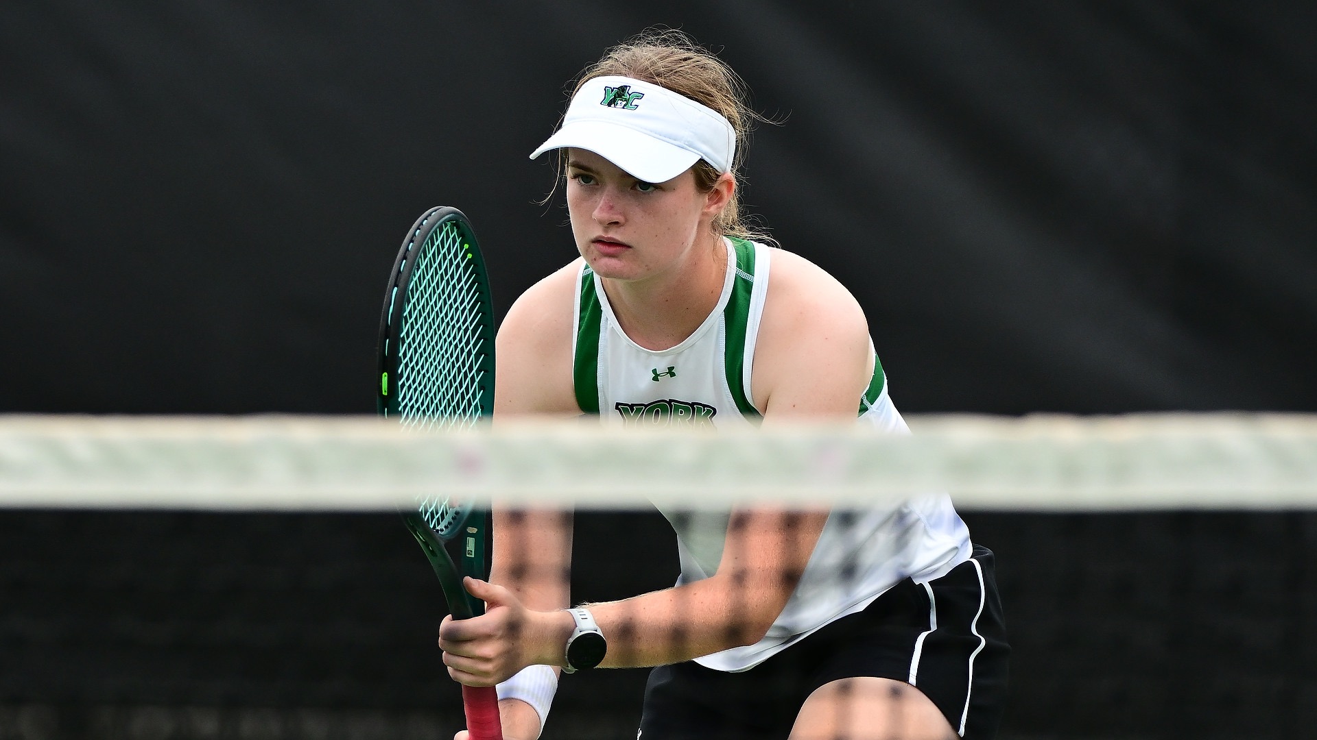 female tennis player stares down opponent