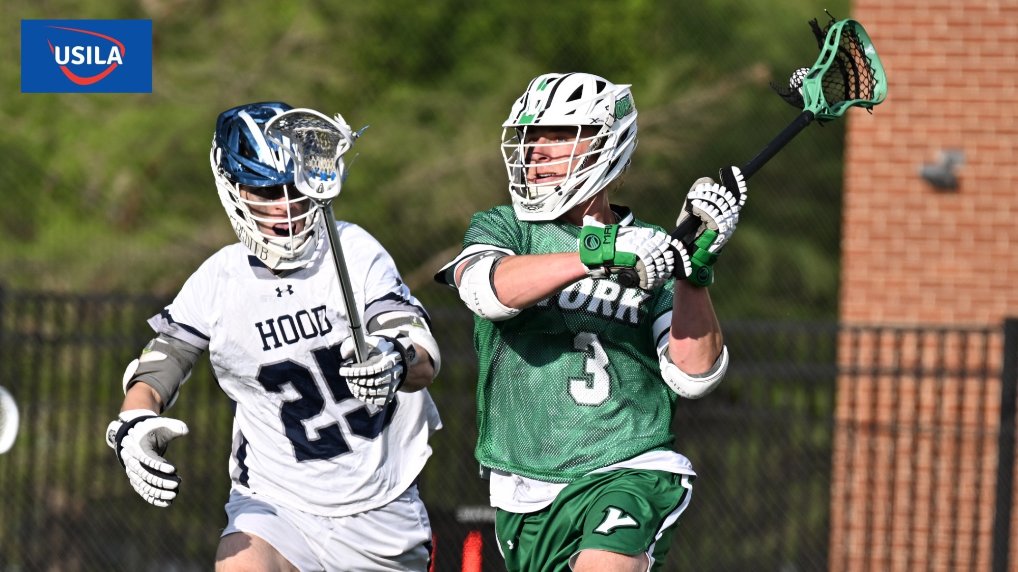 Male lacrosse player makes a pass. USILA logo in upper left corner.