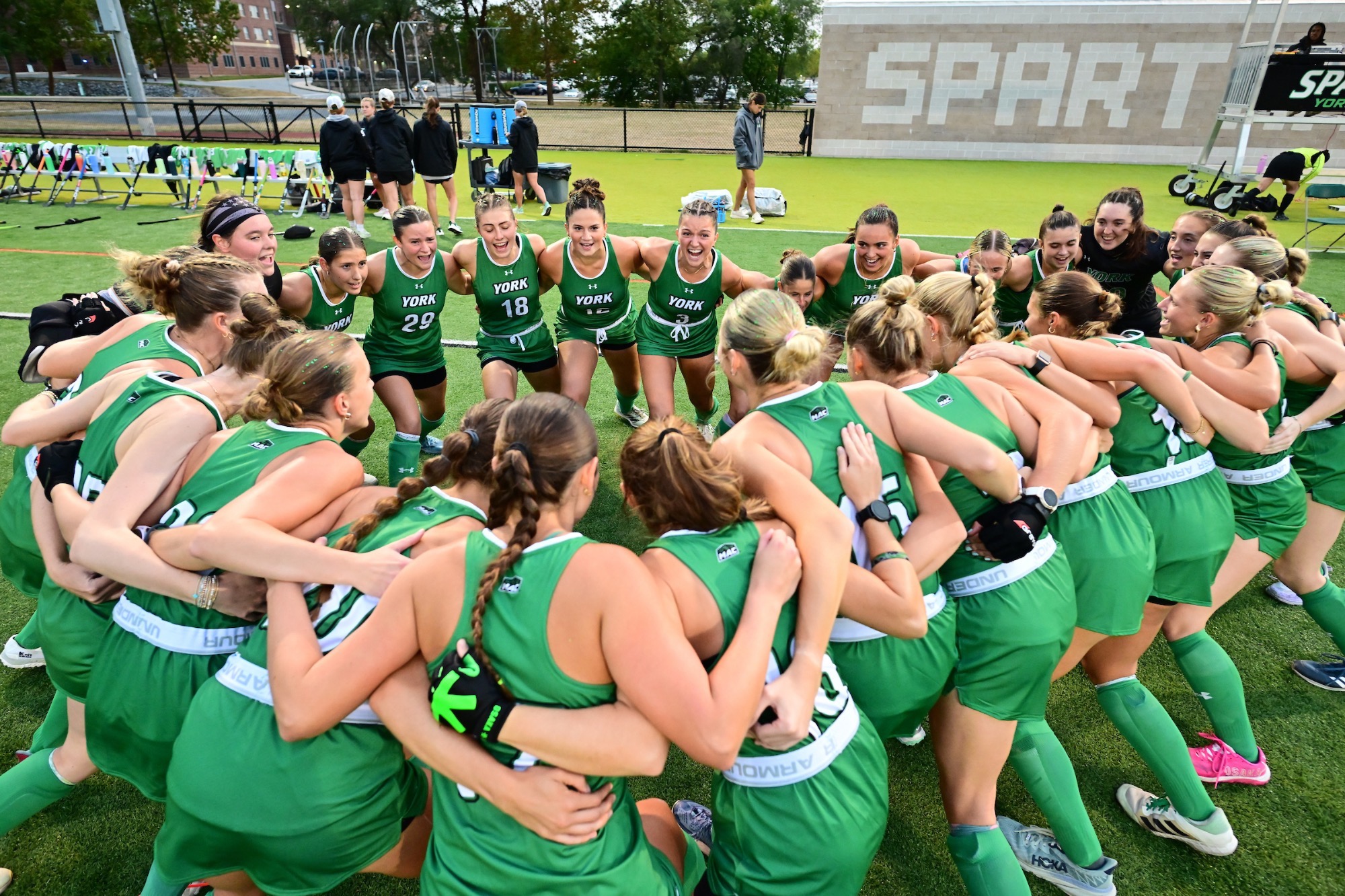 Field Hockey Team in huddle