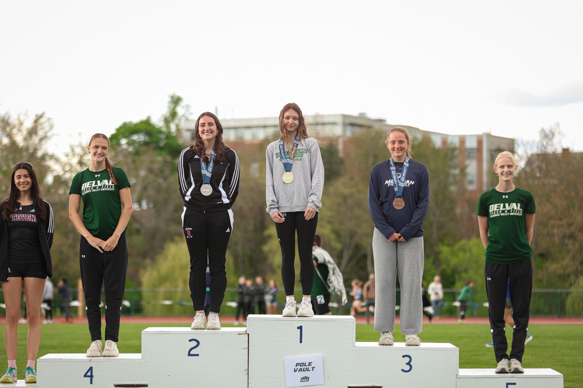 female standing on podium