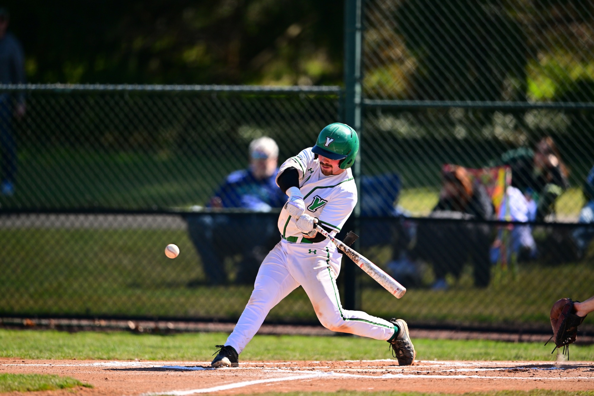 male swinging baseball bat