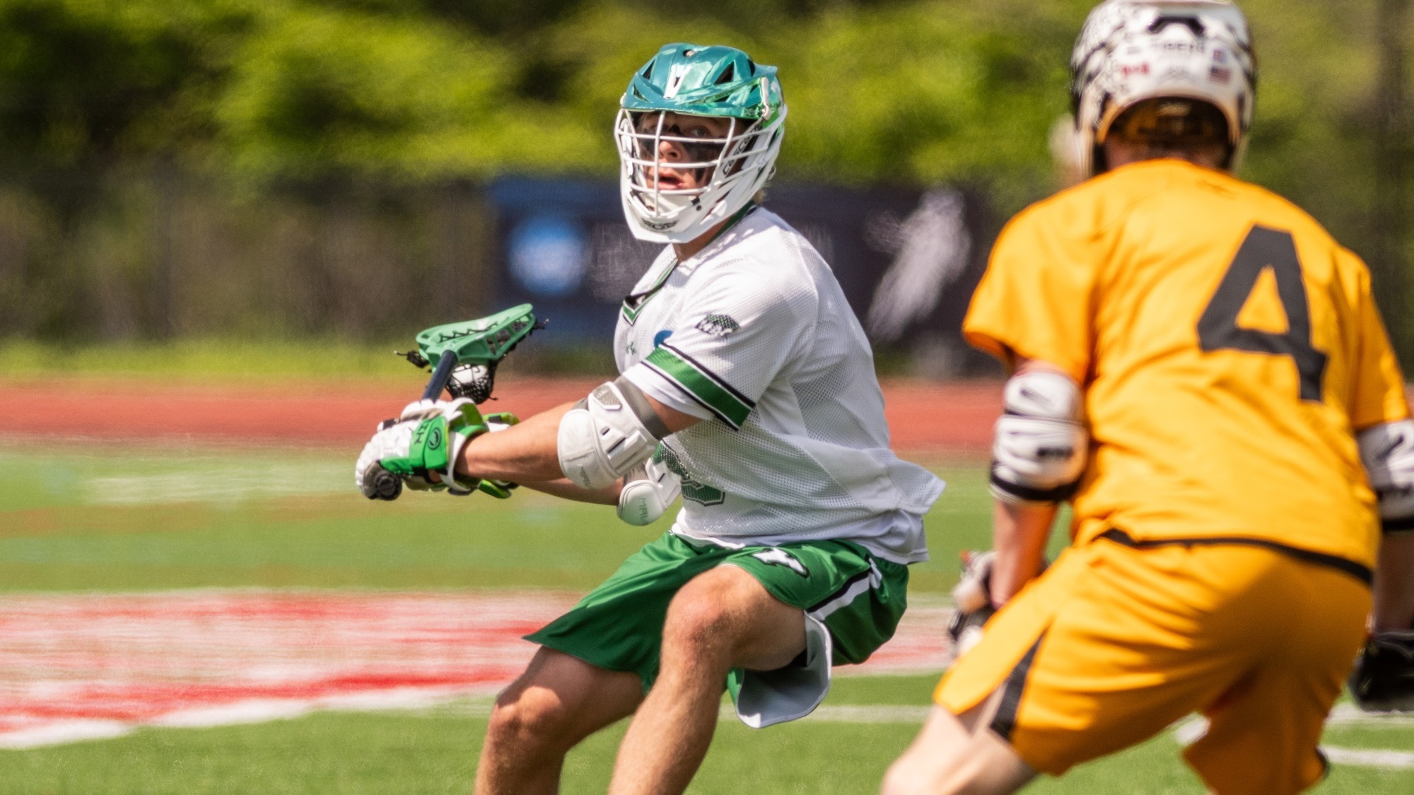 men's lacrosse player eyes up a shot against Colorado College