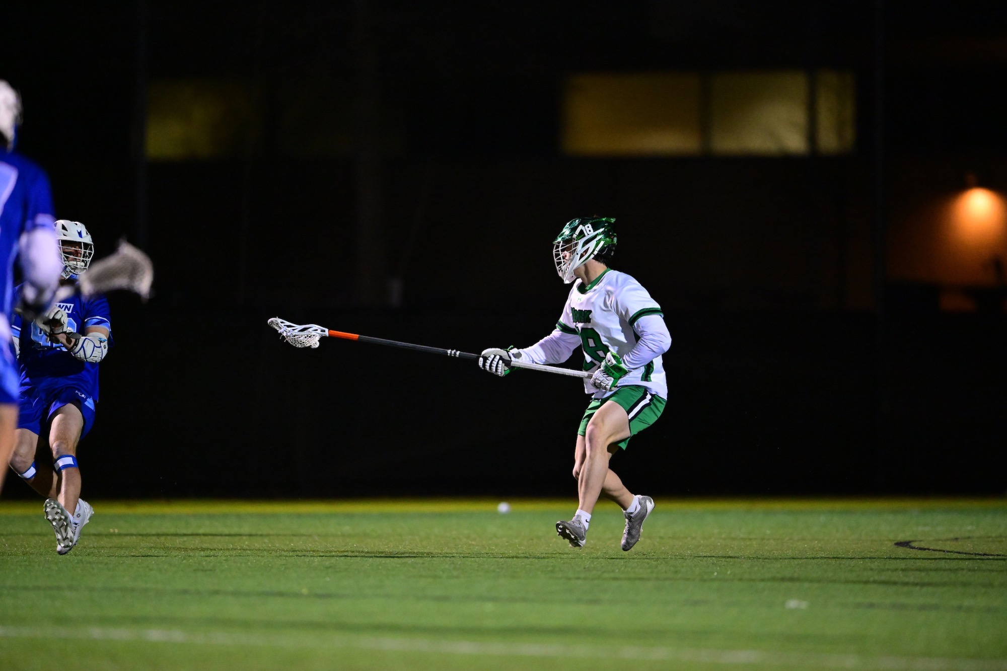 male in lacrosse uniform