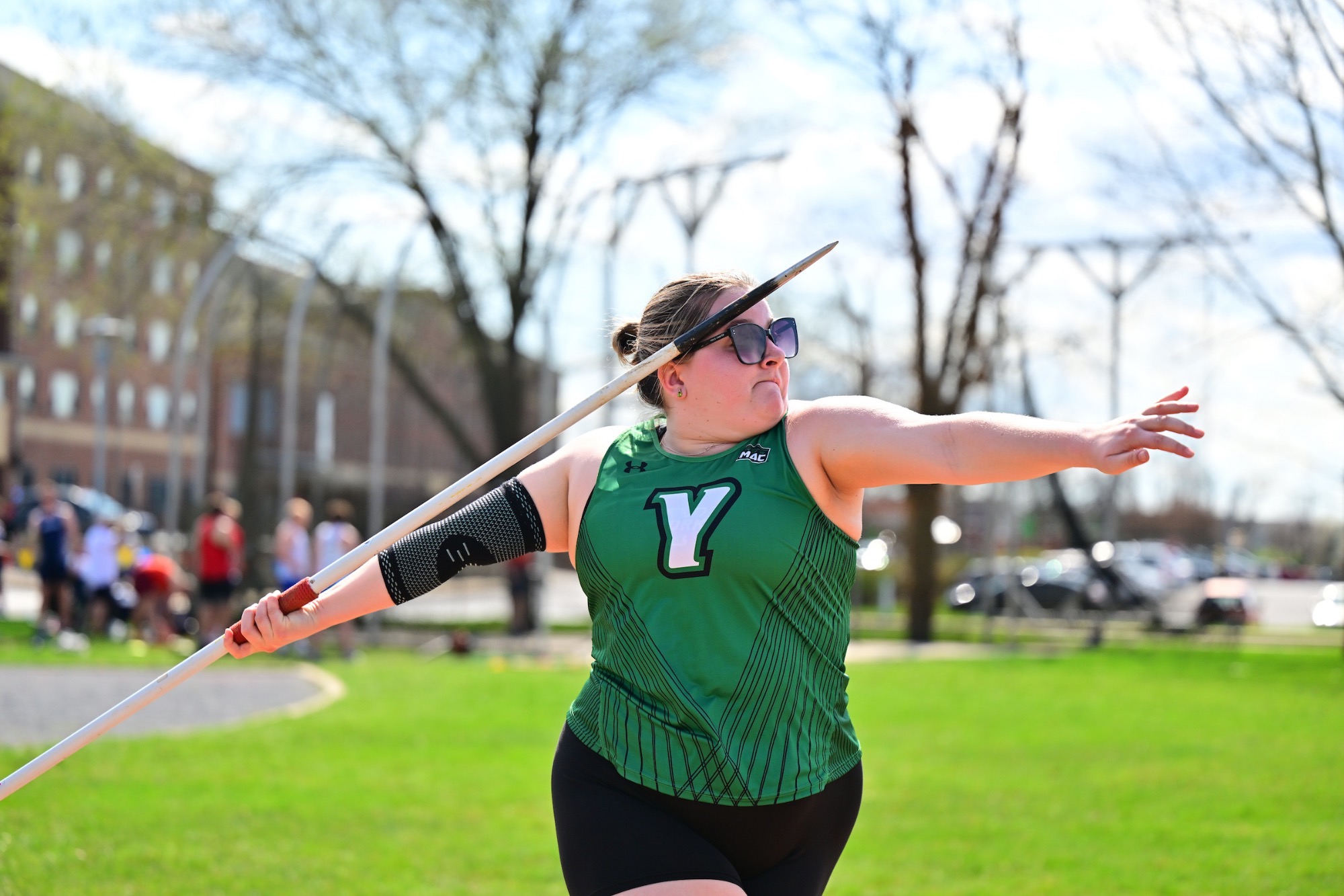 female throwing a javelin